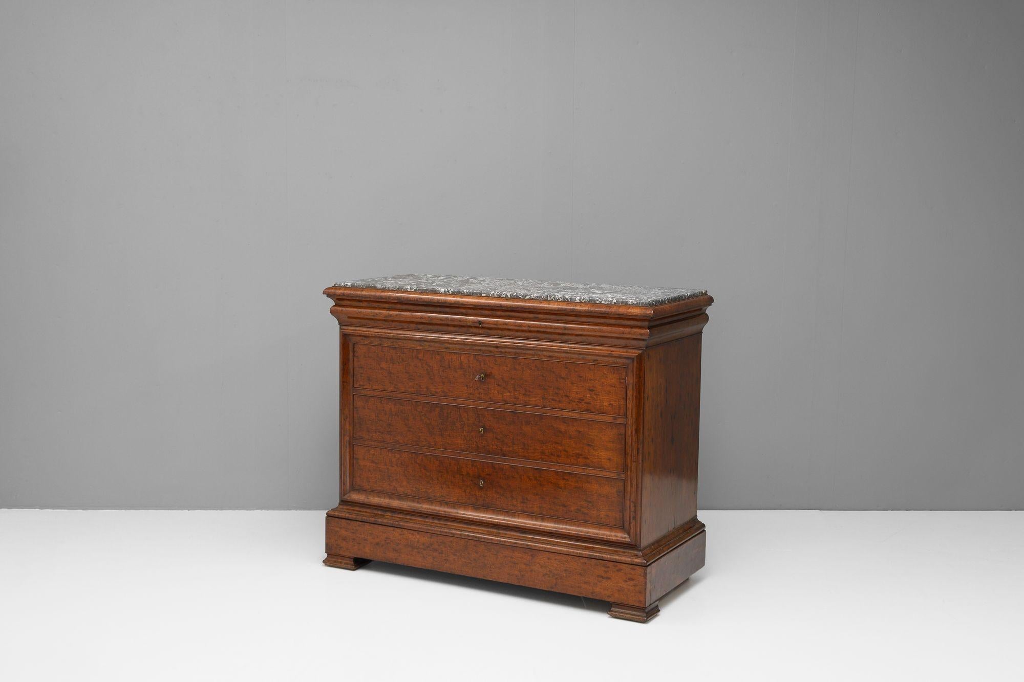 French mahogany commode with secretaire drawer. Circa 1870.