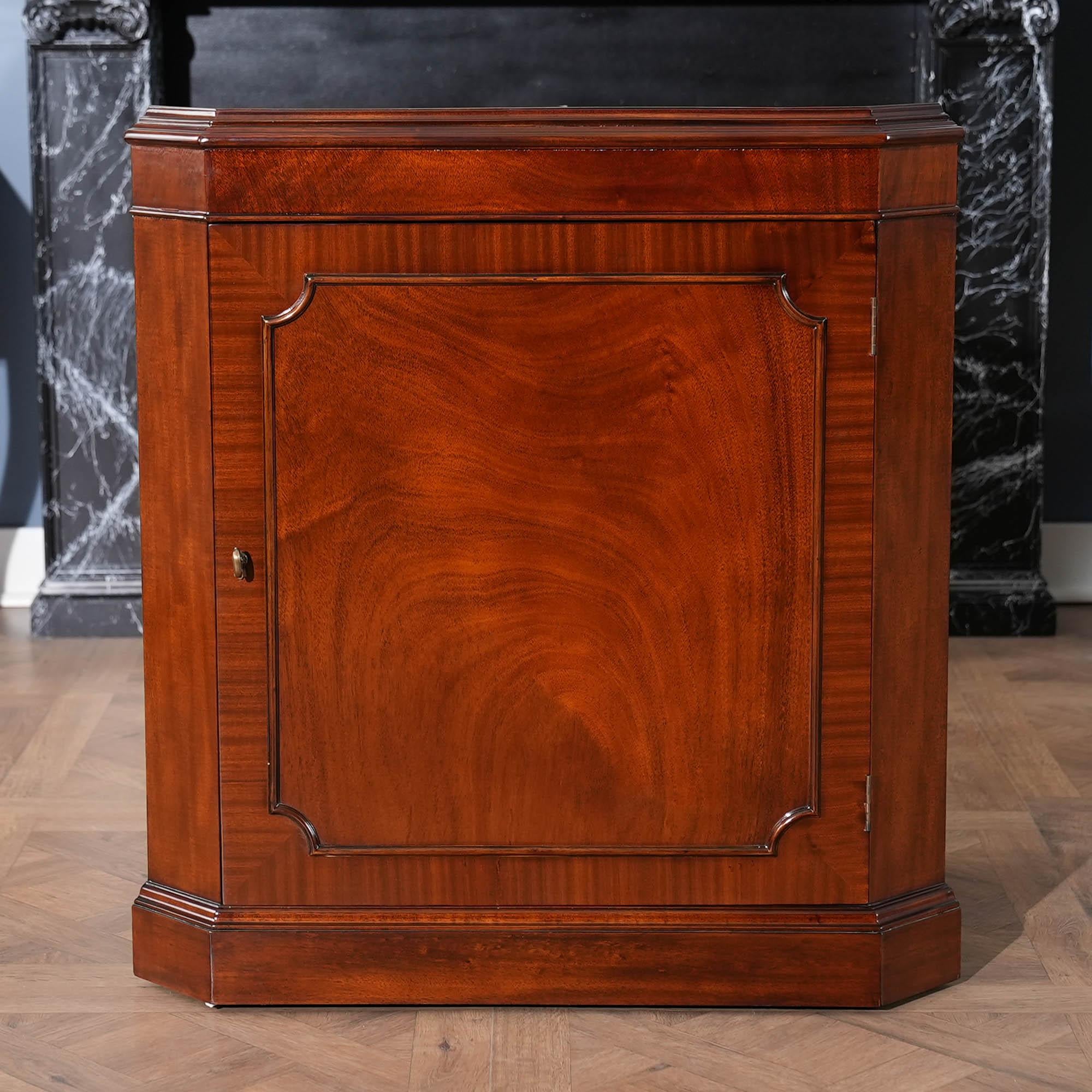 The Mahogany Corner Cabinet. A two part Corner China Closet which can be shipped and installed easily is made from kiln dried, plantation grown mahogany solids and mahogany veneers. Our corner china features a broken arch, swan neck pediment on the