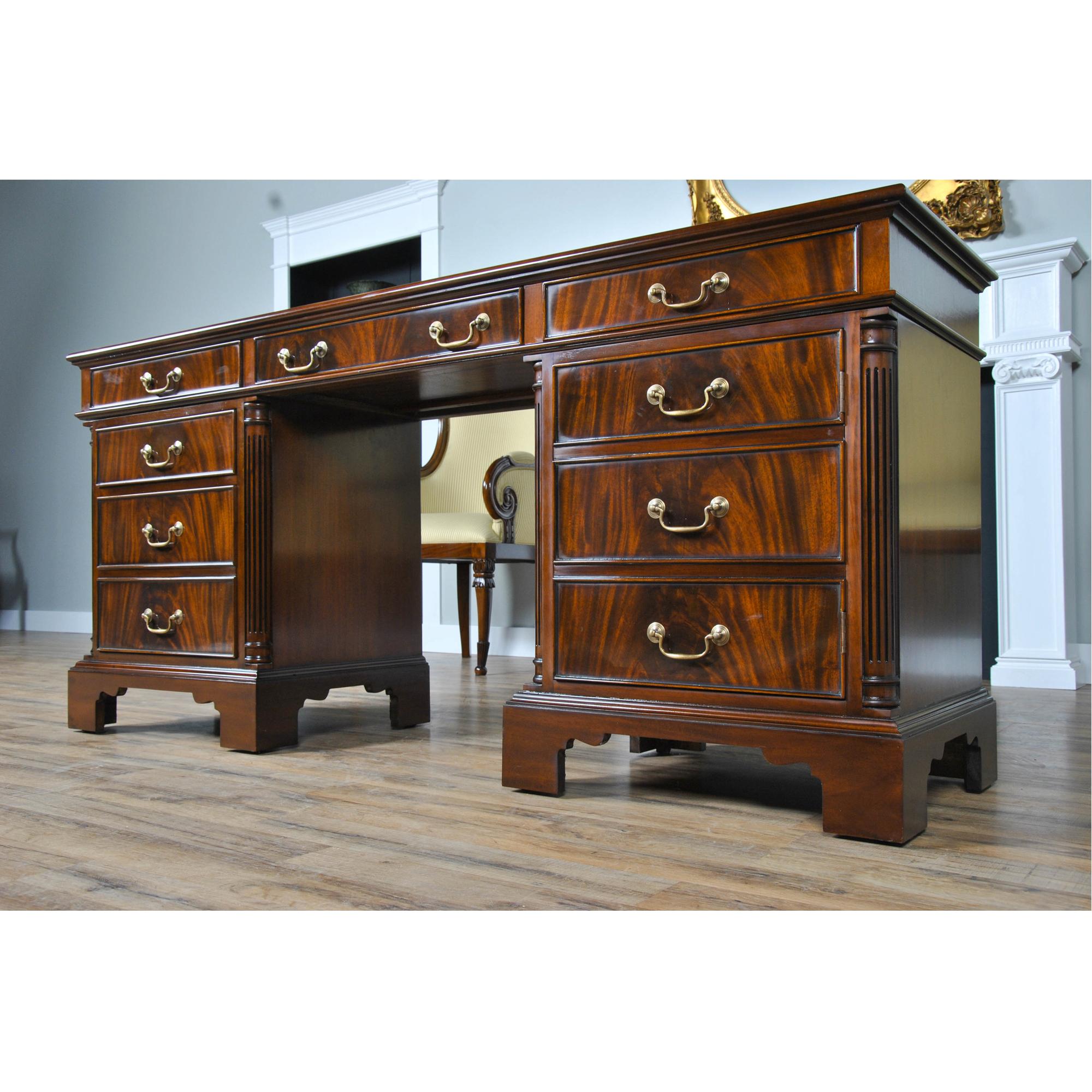 This Mahogany Credenza matches a number of other items in the Niagara Furniture office collection. The credenza utilizes three part construction, the top and two pedestals separate from one another for shipping and installation. The top section