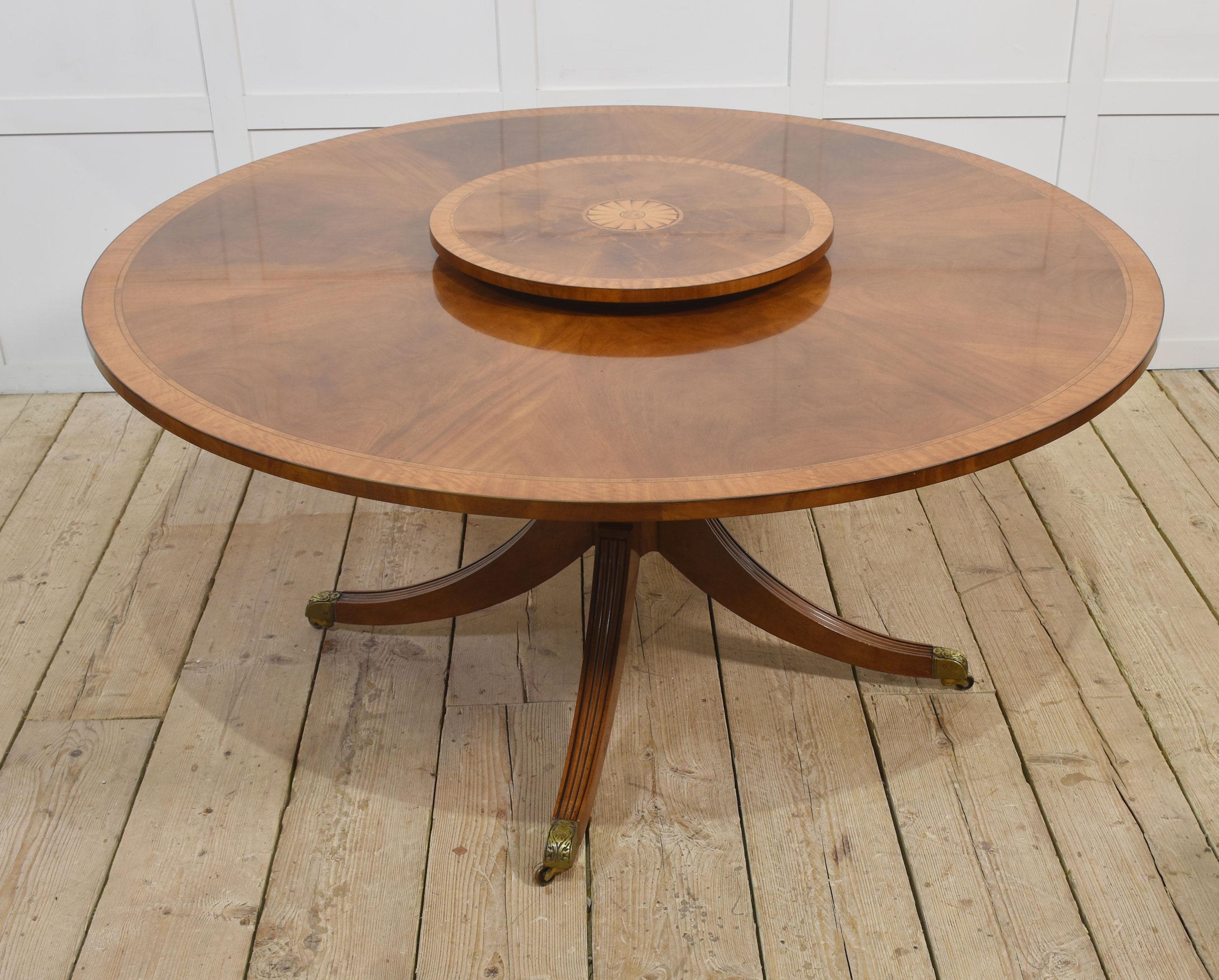 Mesa de comedor circular de caoba con bandas cruzadas en venta 1
