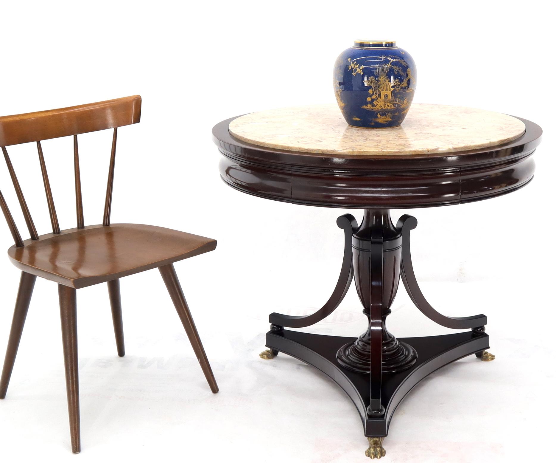 Very fine one drawer mahogany Regency gueridon center lamp table with brass feet.