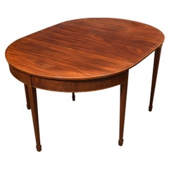 Mesa de comedor en D de caoba
