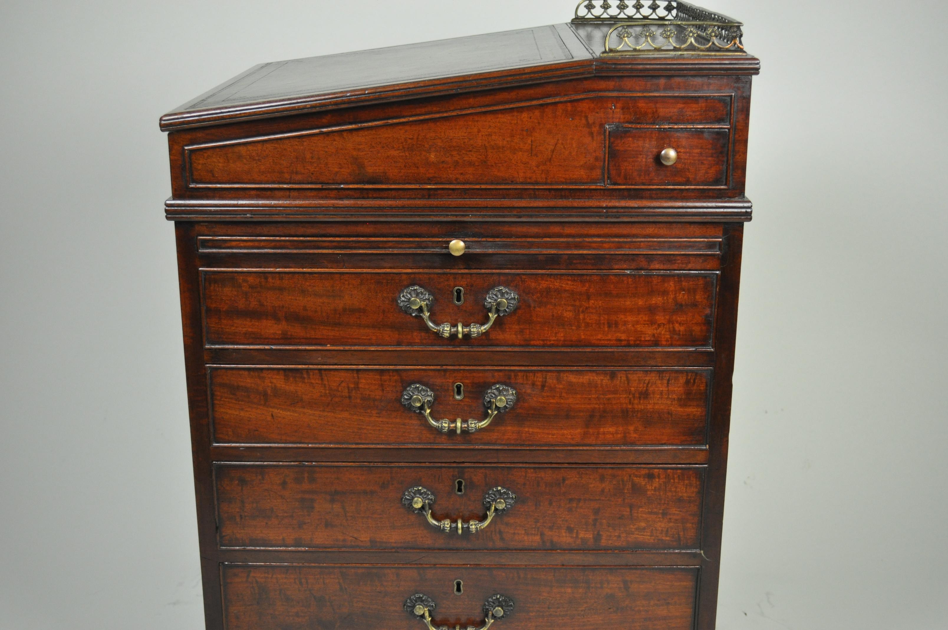 Attributed to Gillows
A superior quality late 18th/early 19th century mahogany Davenport Desk The leather-lined top with brass gallery, lifting to reveal a satinwood faced interior with small drawers. Below are pull-out slides on either side and
