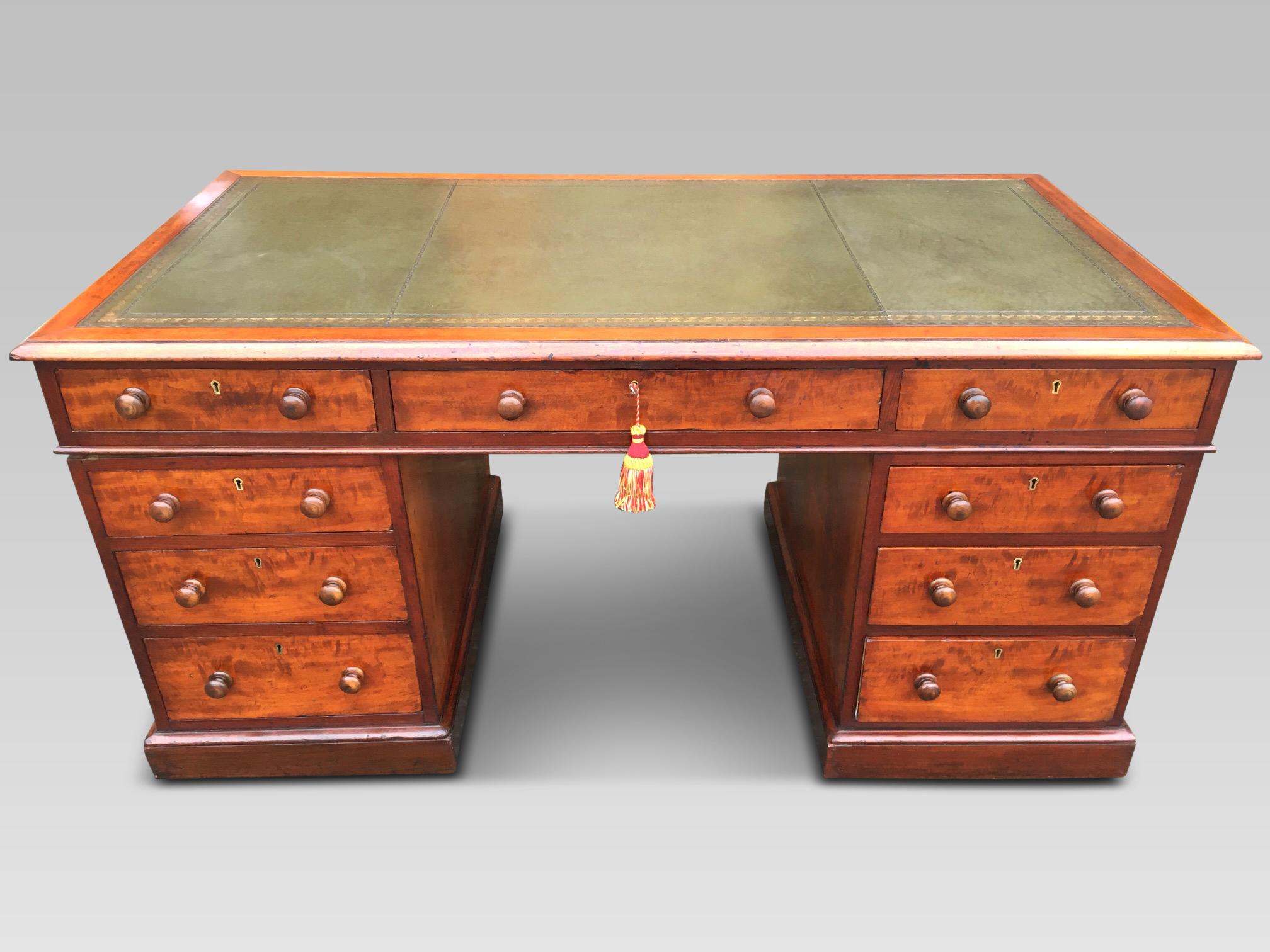 Handsome mid-19th century mahogany pedestal writing desk, English, circa 1850
This delightful desk has 9 smoothly running drawers with wooden knobs and is shown
here in excellent condition. Made during the 1850s from solid mahogany, it is seen