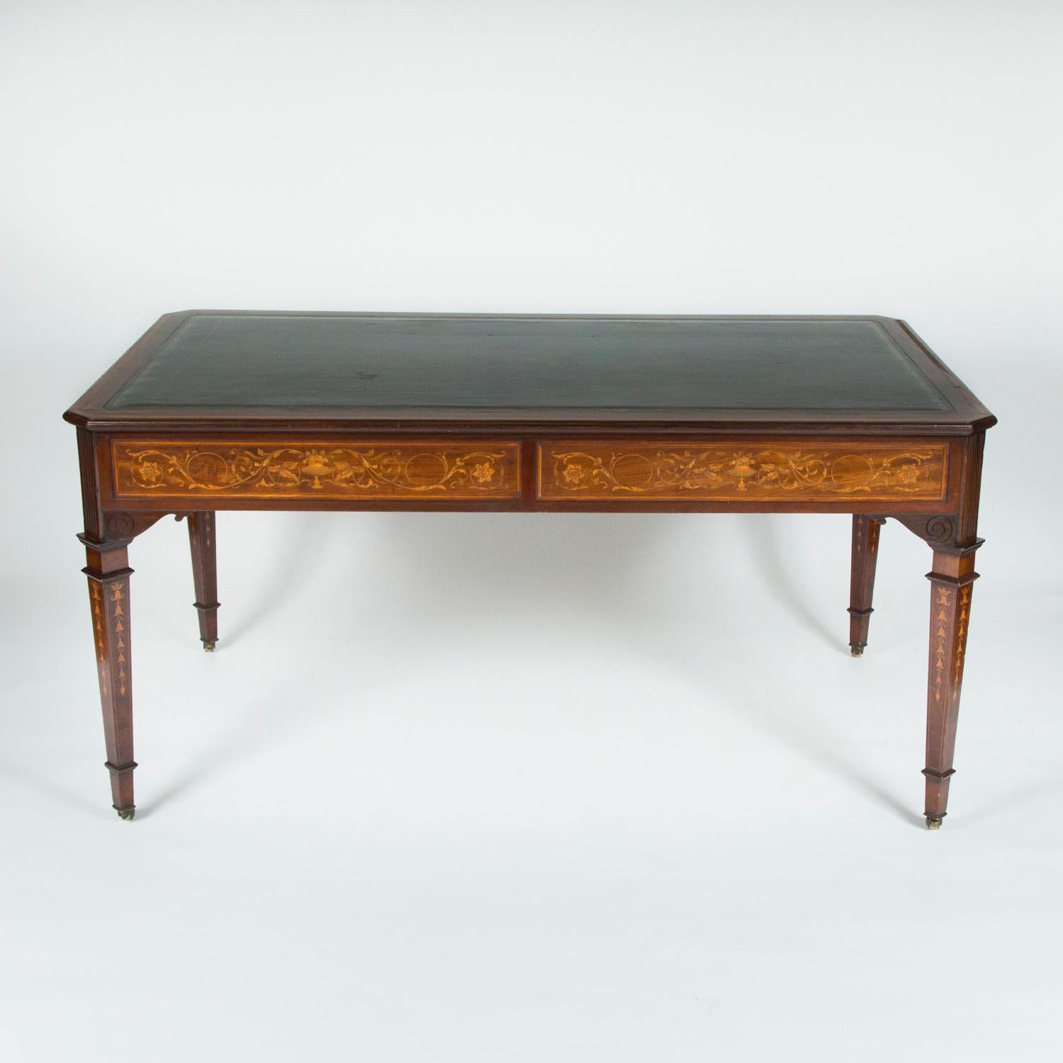 English Mahogany writing table with detailed floral marquetry & carved decoration For Sale