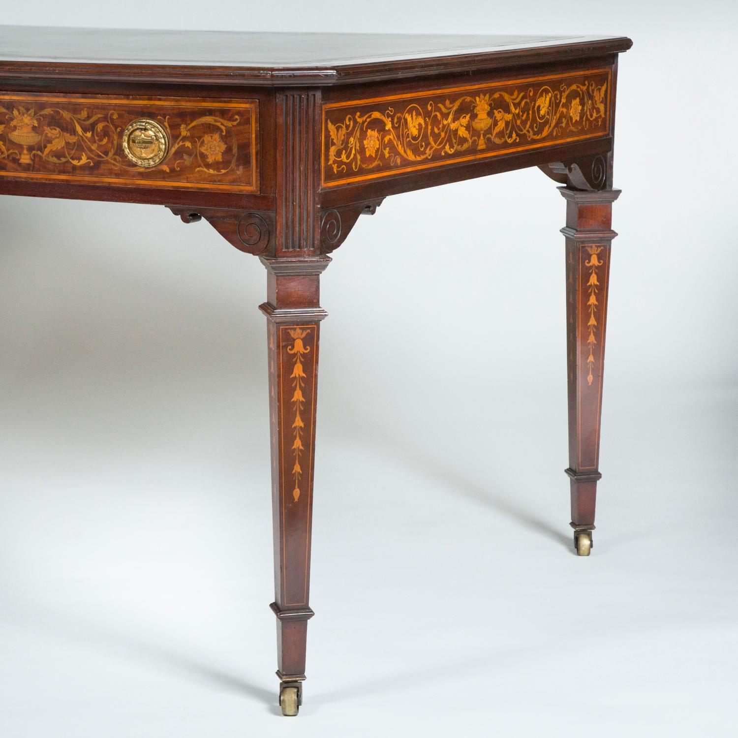 Leather Mahogany writing table with detailed floral marquetry & carved decoration For Sale