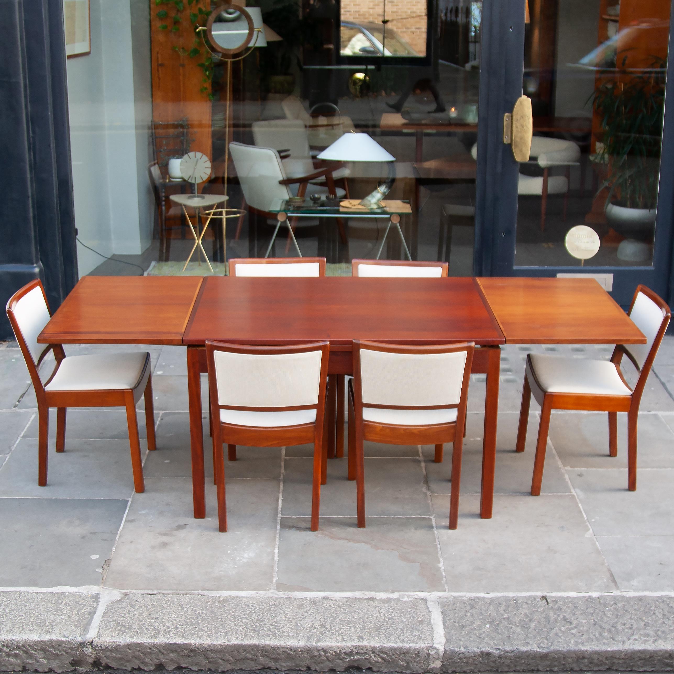 A beautiful solid Danish mahogany dining table and set of six chairs - exceptionally rare. Designed by Tove and Edvard Kindt Larsen, c. 1935. 

This is a particularly interesting example of a collaborative venture between Tove and Edvard