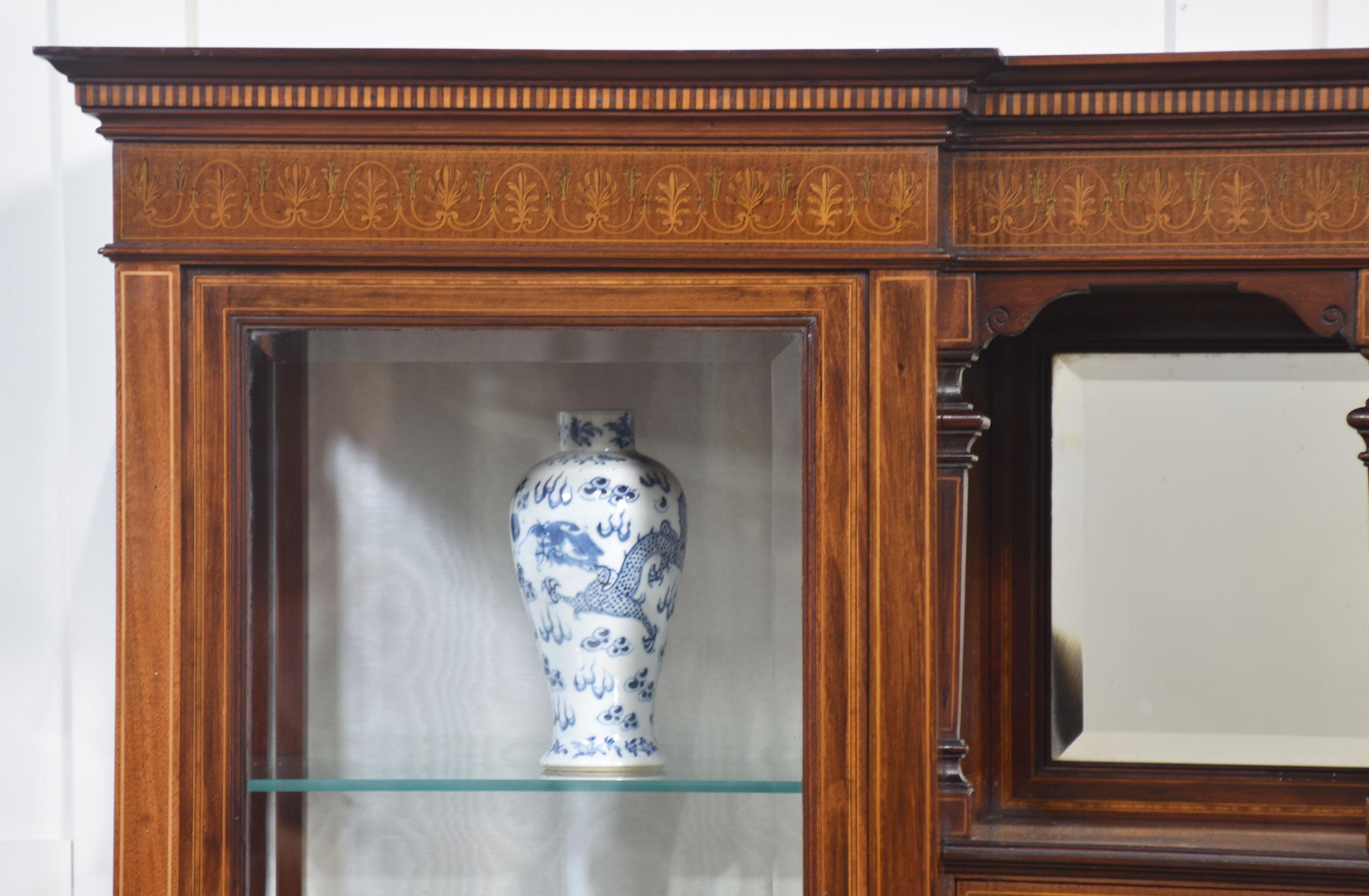 British Mahogany display cabinet by Maple and Co For Sale