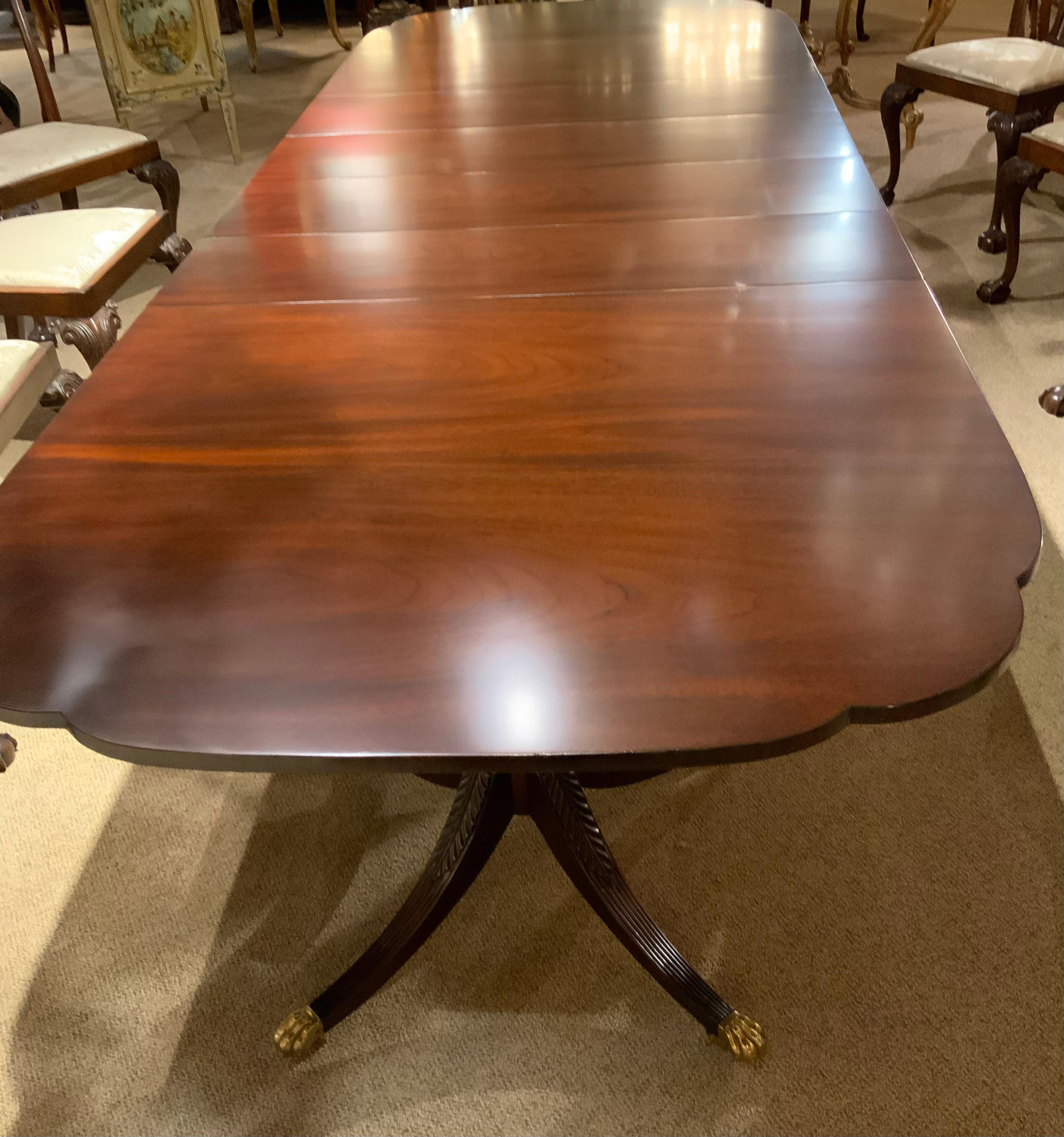 American Mahogany double pedestal george III - style dining table with four leaves