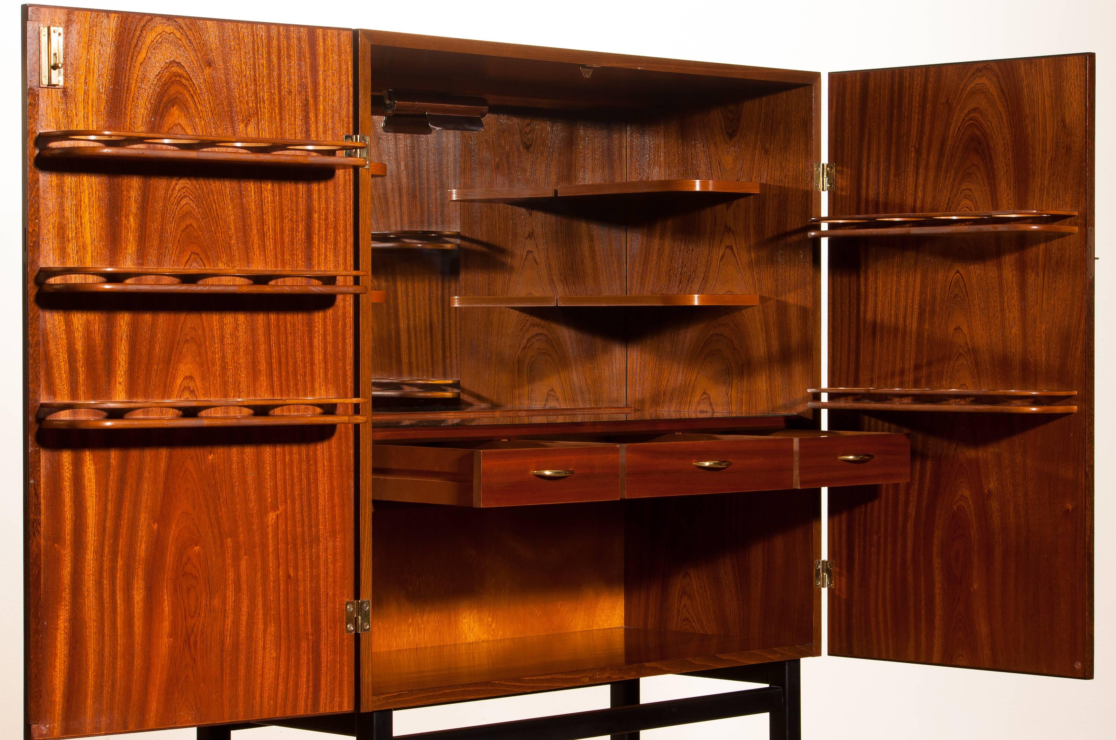 Mahogany Dry Bar Cabinet, Brass Details, High Black Skinny Legs Made by Förenade 4