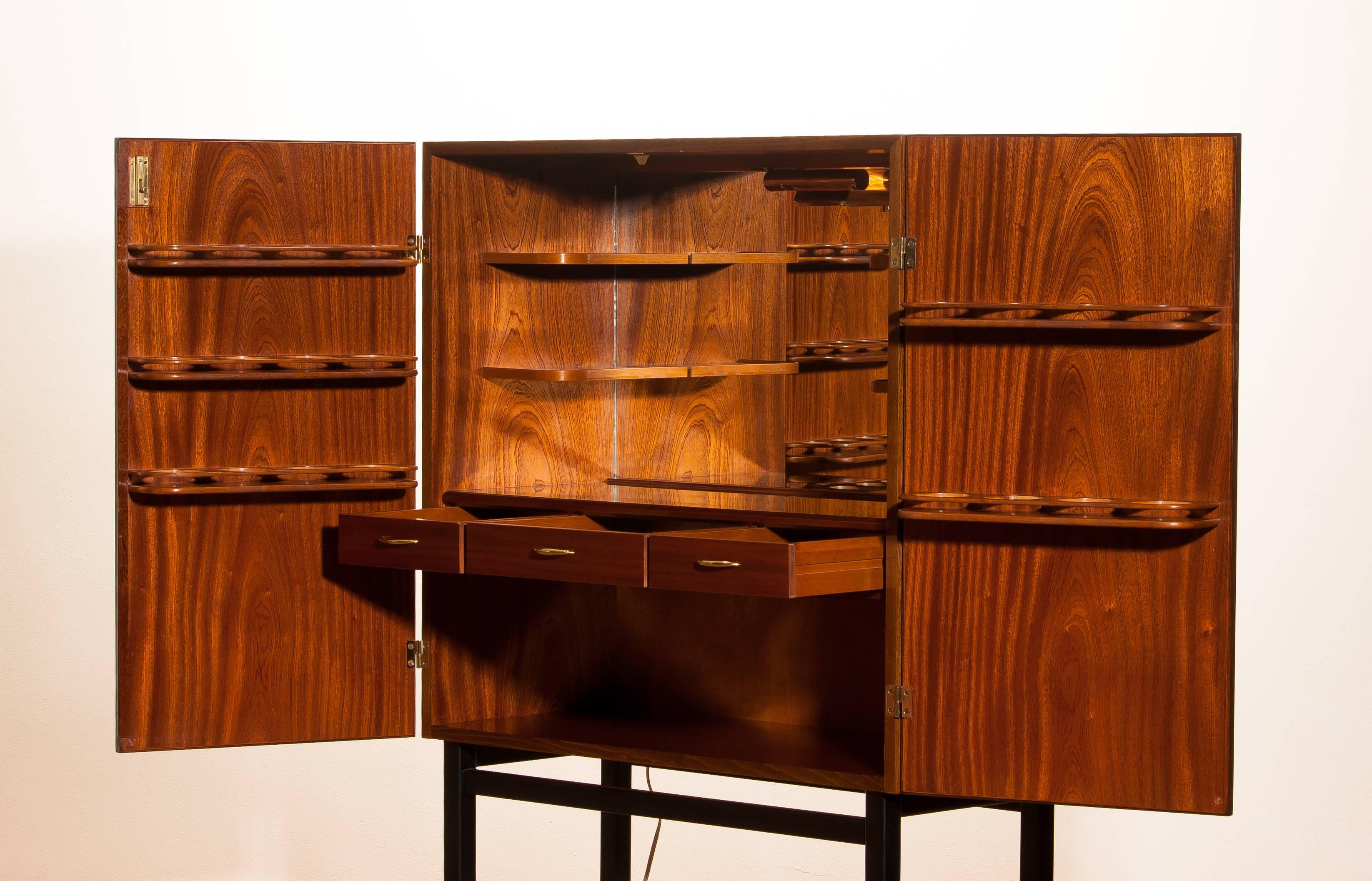 Mahogany Dry Bar Cabinet, Brass Details, High Black Skinny Legs Made by Förenade 5