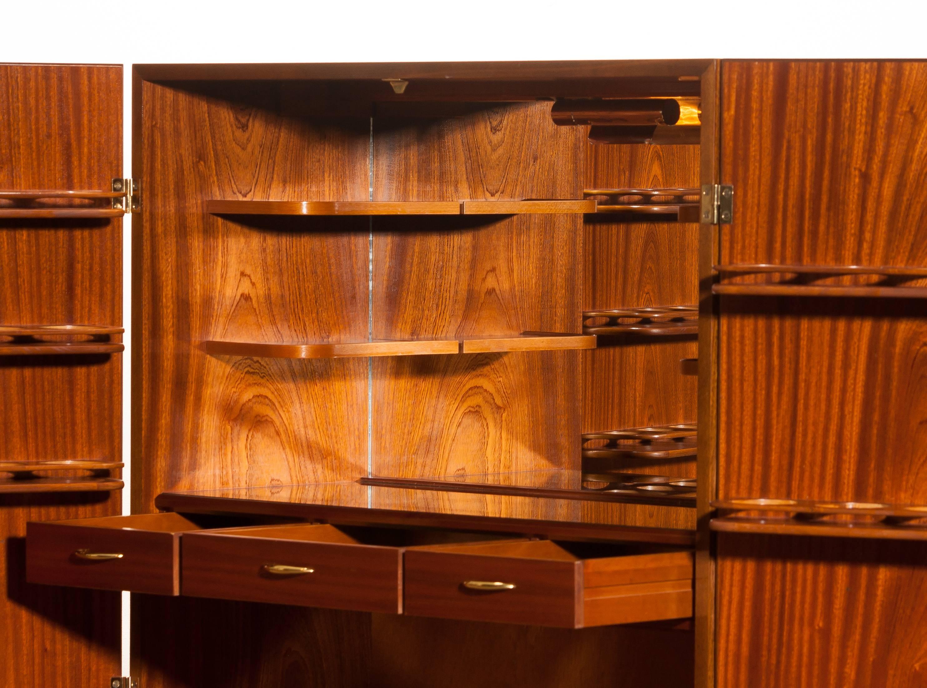 Mahogany Dry Bar Cabinet, Brass Details, High Black Skinny Legs Made by Förenade 6