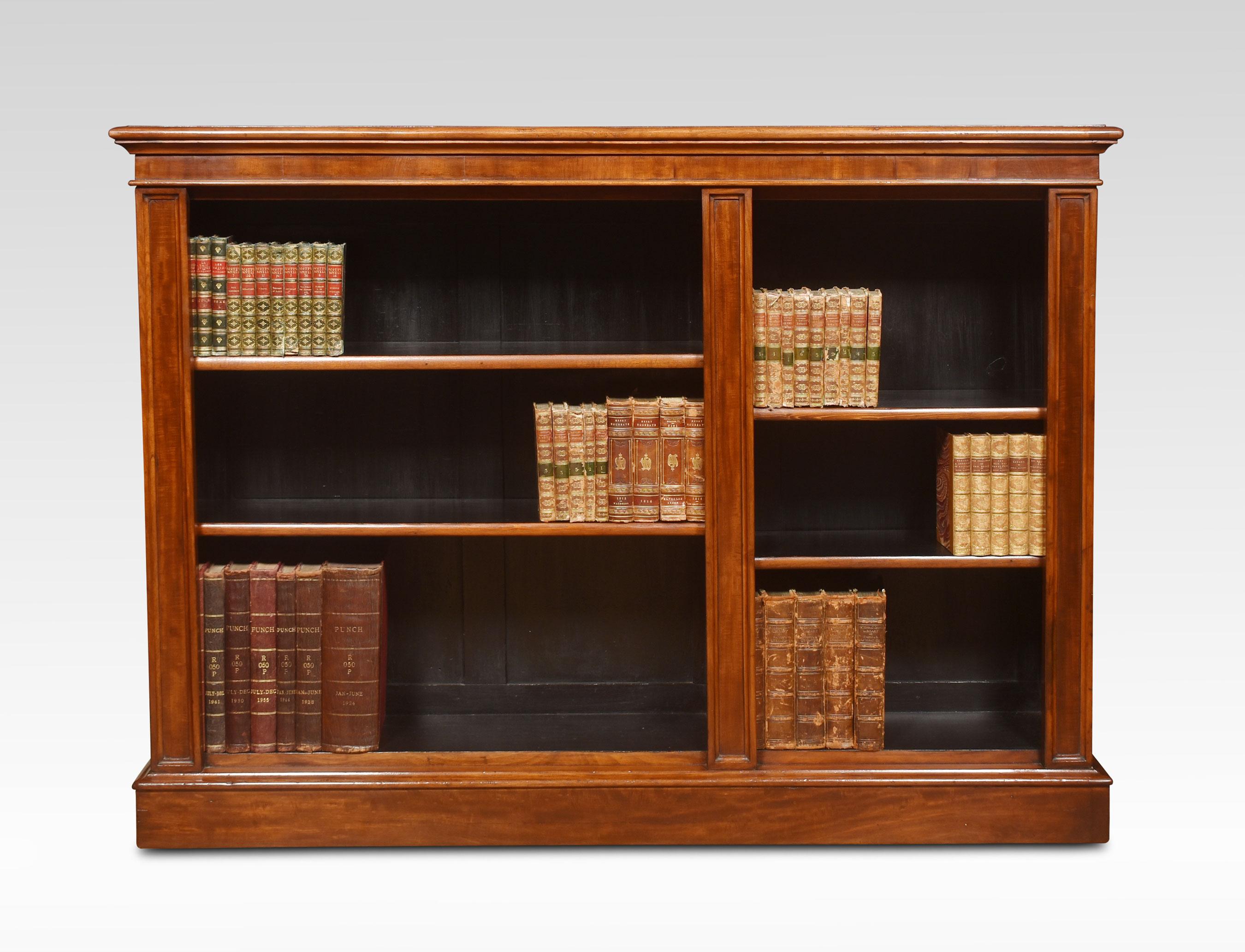 Mahogany open bookcase, the large rectangular top. Above two bays of adjustable shelves divided by column. All raised up on plinth base.
Dimensions
Height 43.5 Inches
Width 62.5 Inches
Depth 13 Inches