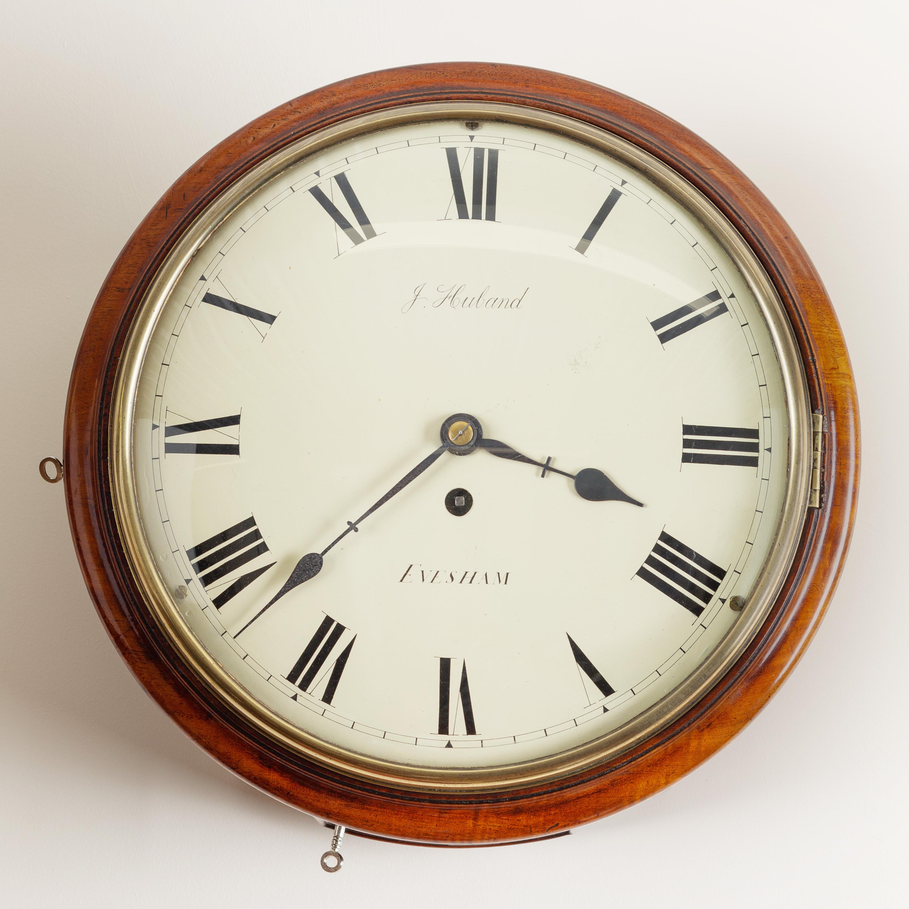 Mahogany round dial wall clock with convex painted dial Roman numerals and signed ‘J.Huband, Evesham’. Cast brass bezel and original ‘blued’ steel hands.


Eight day Fusee movement with substantial shouldered shaped brass plates, circa