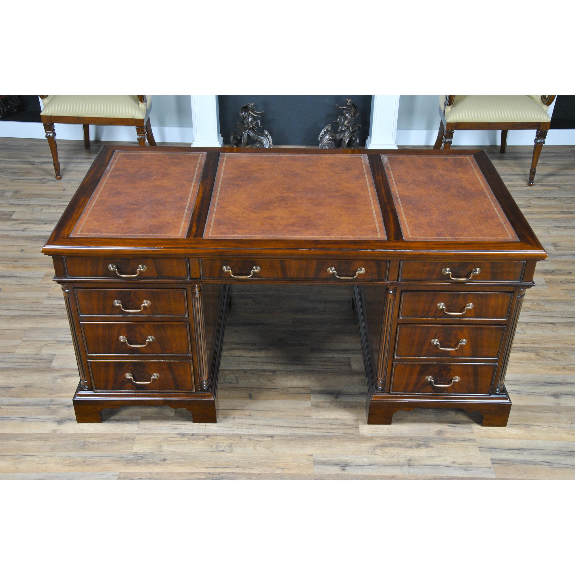 Ideal for use either at work or in a home office the Niagara Furniture Mahogany Executive Desk with a tooled leather top is both beautiful and functional. Built in three sections for easy handling and installation the top section boasts three deep