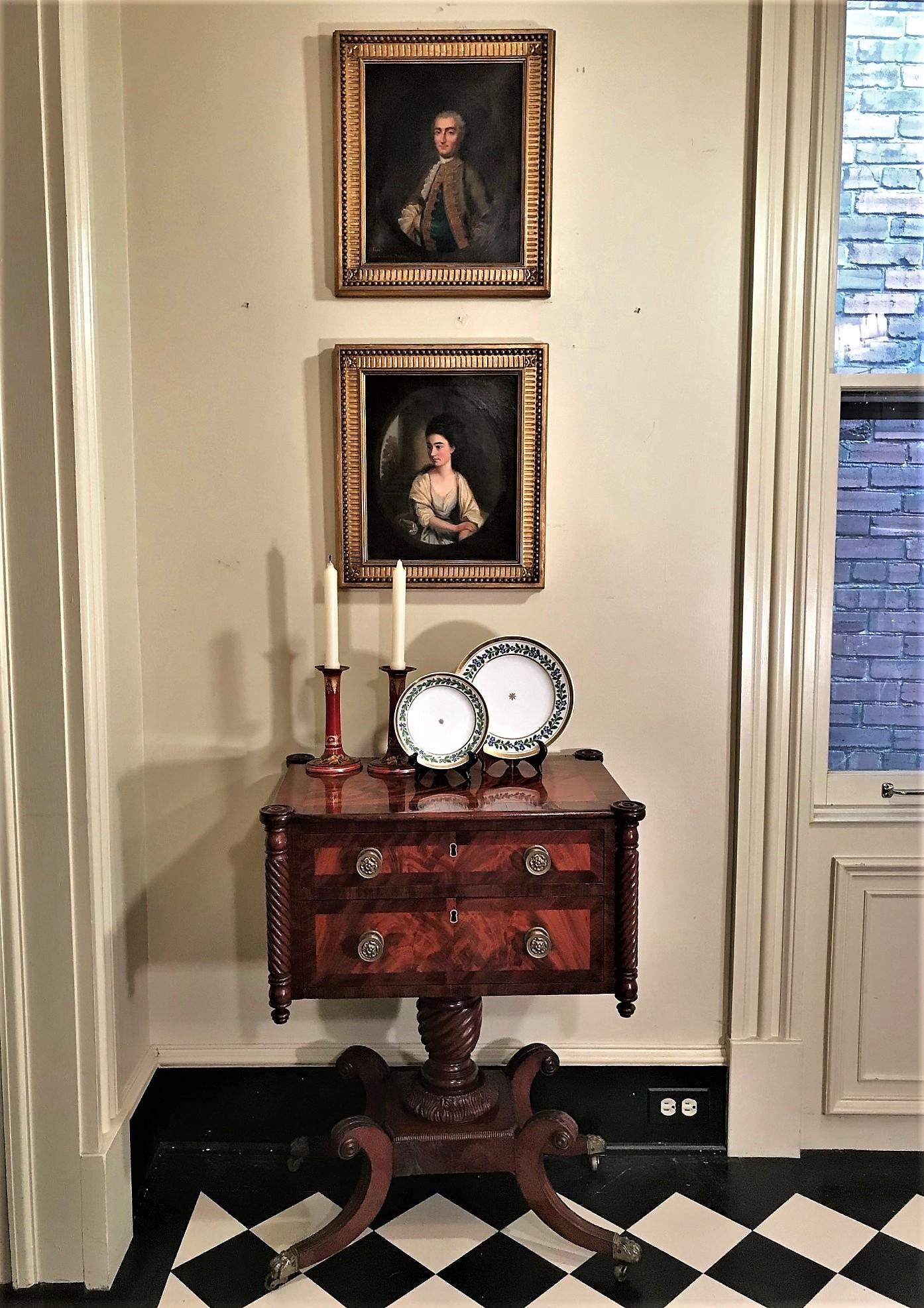 This handsome unique sewing/work stand is quintessentially the work of a master Philadelphia cabinetmaker. It has 2 drawers with replaced hand-cast solid brass pulls and original brass locks. The top drawer has a sliding removable divided mahogany