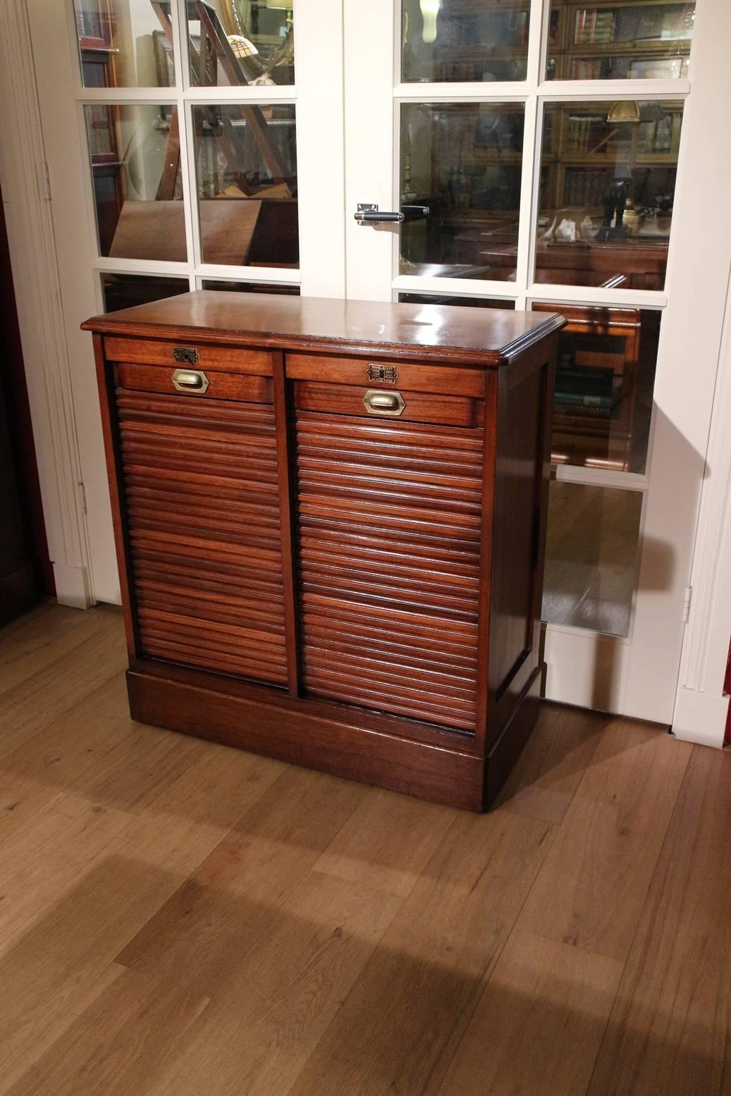 Beautiful file cabinet with shutters. Completely in good and original condition. Handle and keyplate in Art Nouveau style. 

Origin: France.
Size: W 82cm, D 40cm, H 90cm.