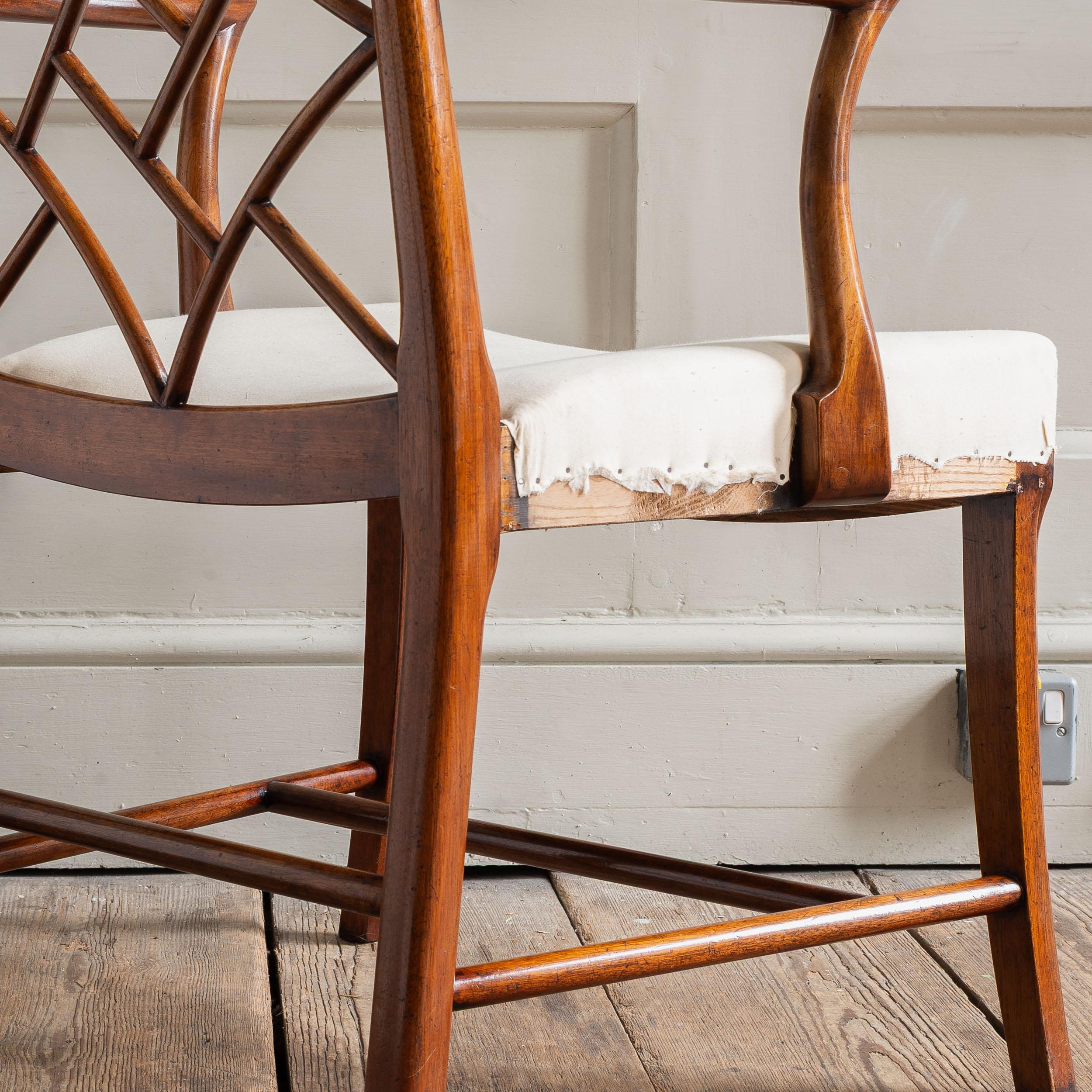 A mahogany Cockpen chair, early to mid-twentieth century, after the Scottish, mid-eighteenth century originals, upholstered to calico and ready for recovering.