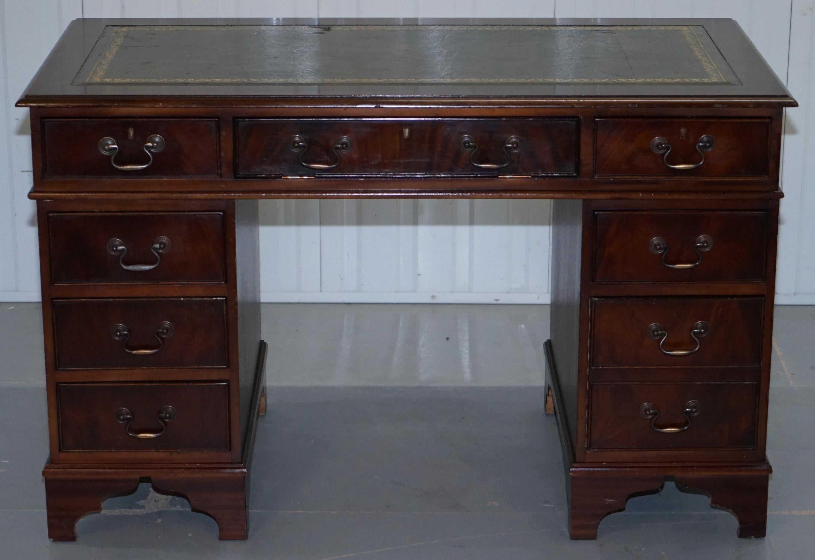 We are delighted to offer for sale this vintage Twin Pedestal partner desk with drop front sliding keyboard shelf

A good looking and well made desk with a premium vintage green leather writing surface, the front drawer is false, it drops down to