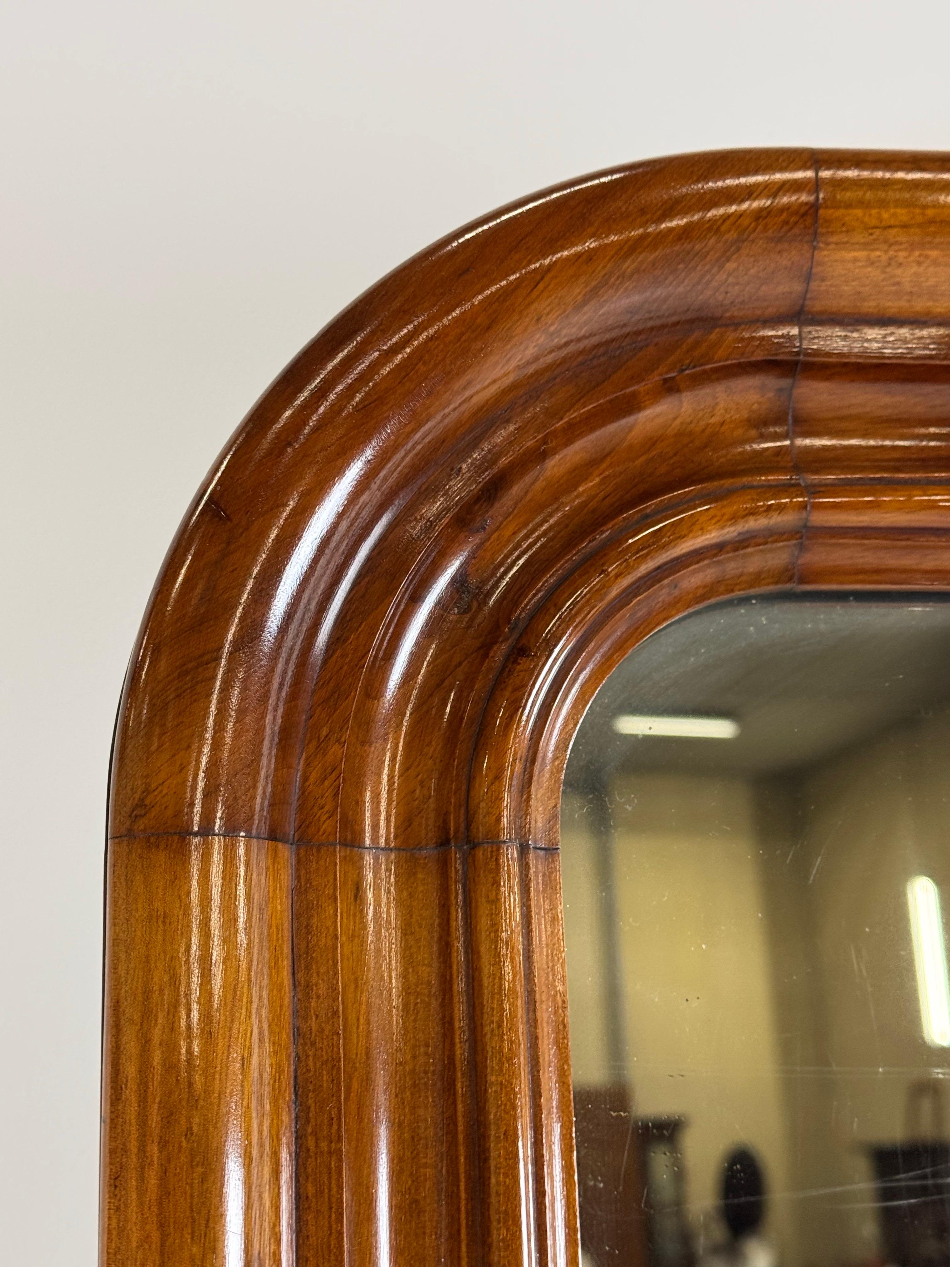 Very neat French hall mirror. Gigantic in size. Beautiful mahogany frame. With original mercury glass, nicely weathered in several places. Ca. 1900. Condition is very good.

Dimensions: 115W x 209H x 7D