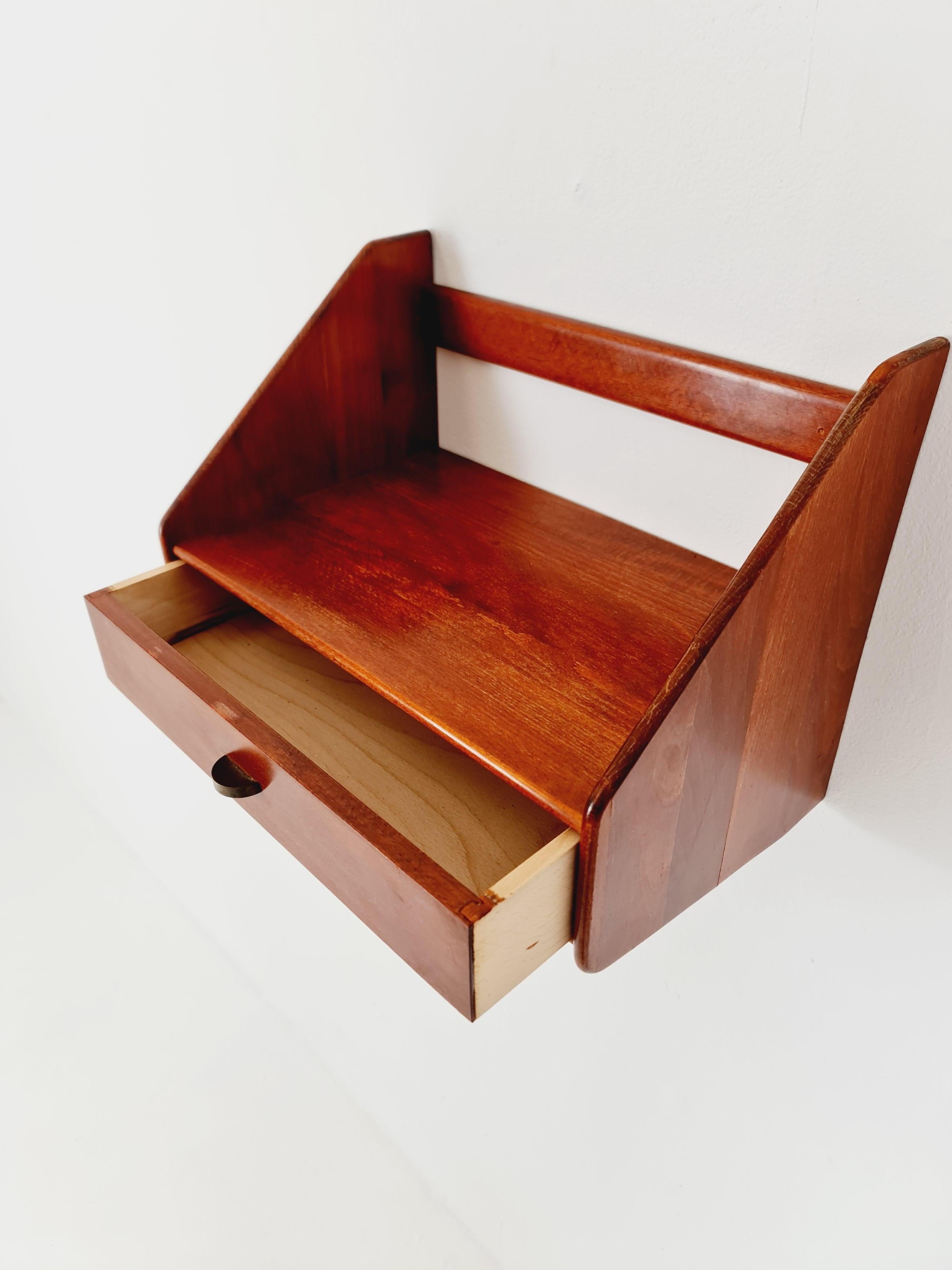 Swedish Mahogany hanging telephone table/ shelf/ bedside table/ nightstand from the 60s For Sale