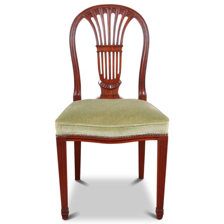 Set of 6 mahogany harp-back chairs. Solid and suitable for everyday use. Seats stuffed with mohair. 


 