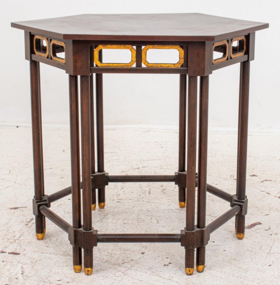 Mahogany veneered hexagonal end table with double colonette supports joined by stretchers. 23