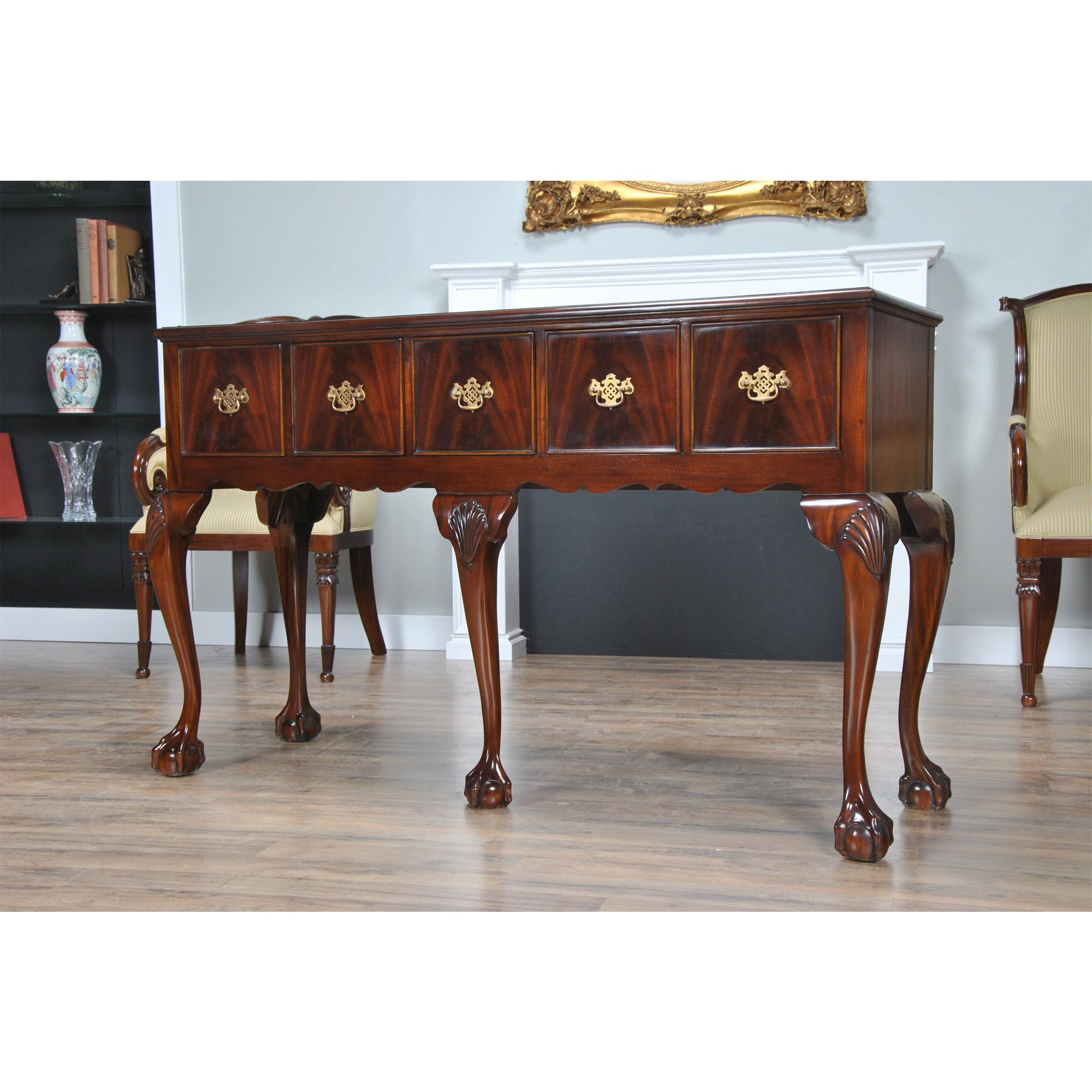 The Mahogany Hunt Board was inspired by antique pieces used in great homes in the Southern United States. This type of sideboard is often also referred to as a Hunt Board.  Narrow in depth the raised leg construction gives a great appearance with