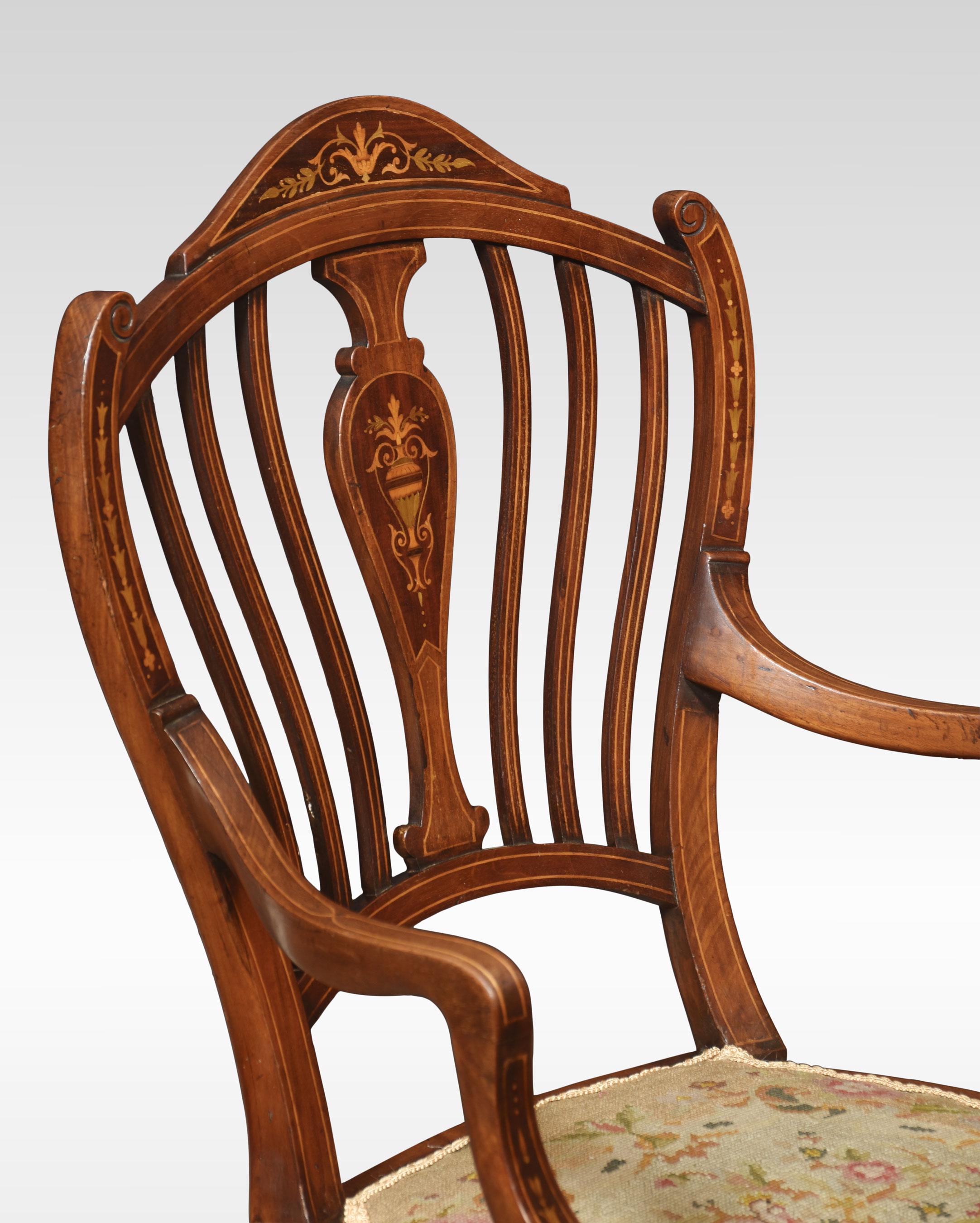 Mahogany inlaid armchair, having shaped back with central inlay, to the needlepoint seat. All raised up on tapering front legs terminating in spade feet.
Dimensions
Height 37.5 Inches height to seat 17.5 Inches
Width 22 Inches
Depth 22.5 Inches