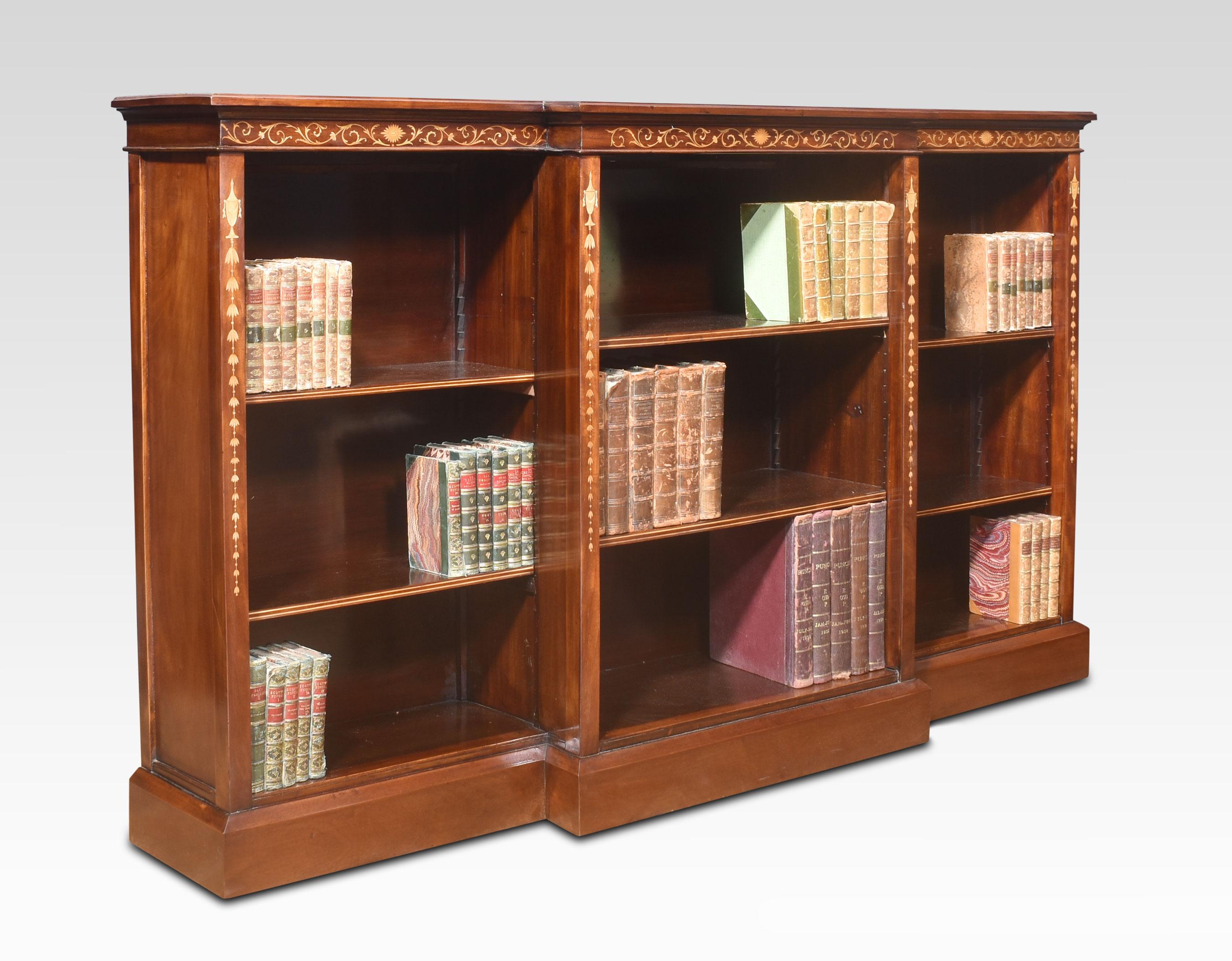 British Mahogany inlaid breakfront open bookcase For Sale