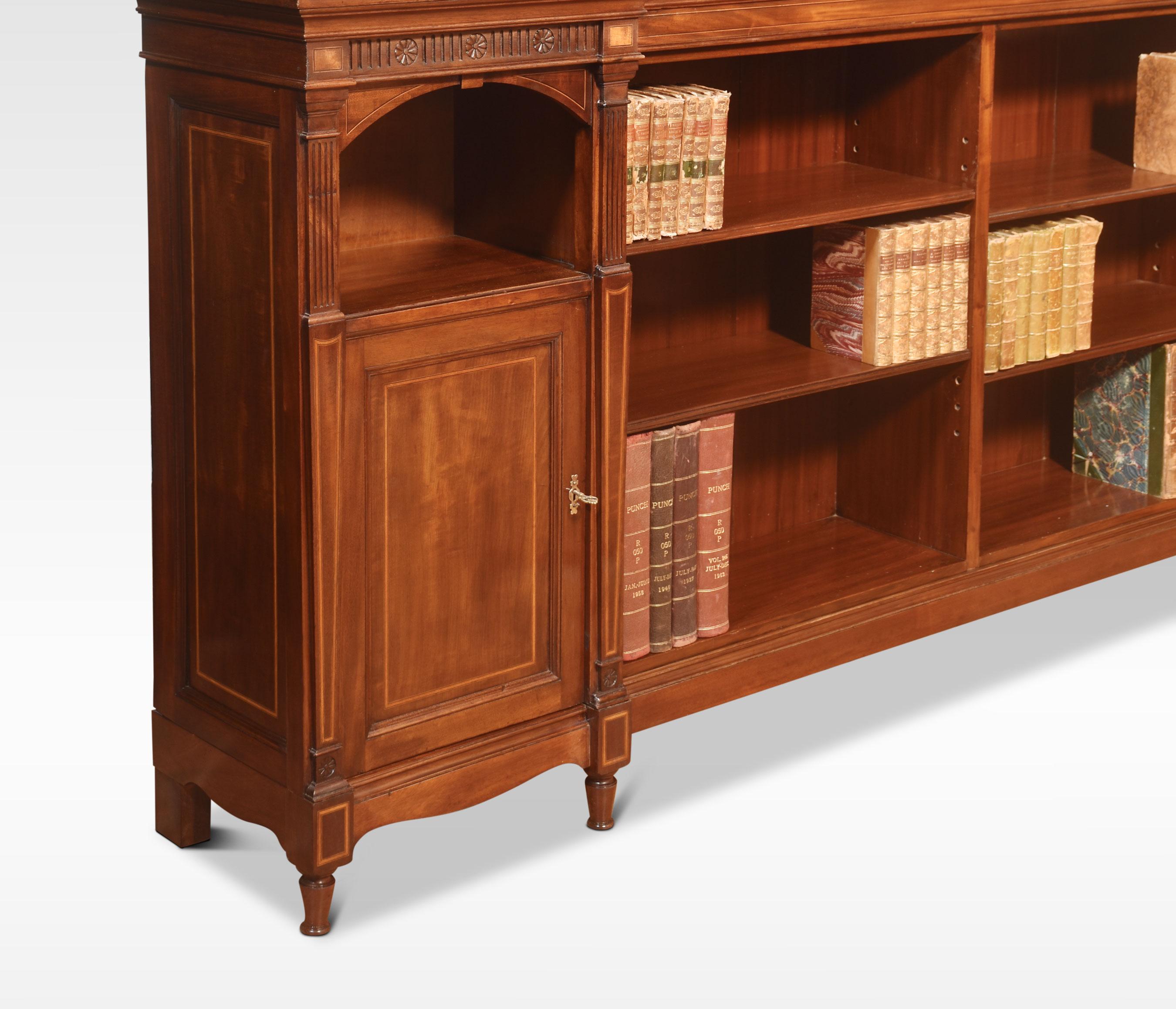 British Mahogany inlaid corner open bookcase For Sale