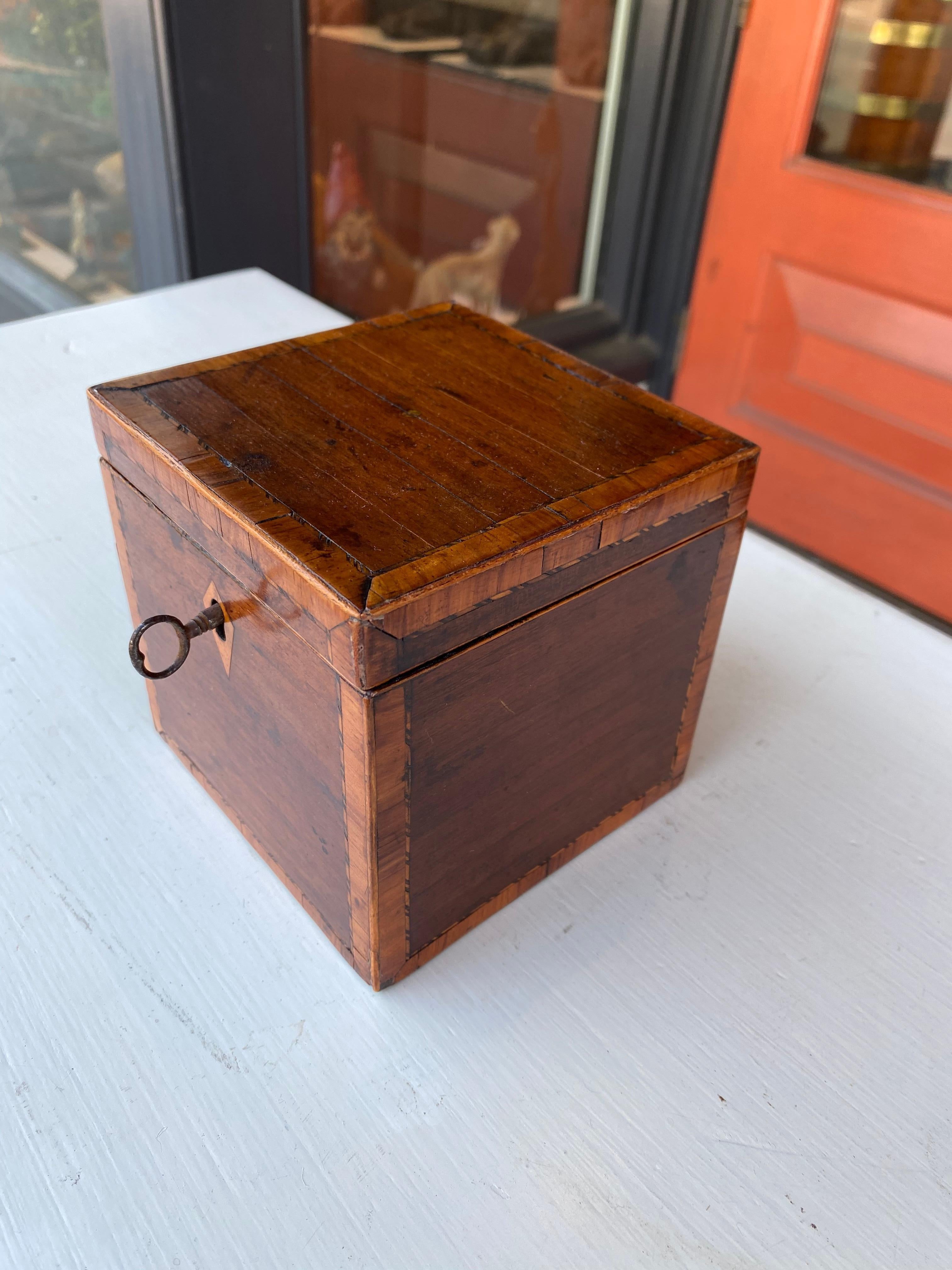 Early 19th Century Mahogany inlaid cube tea caddy with key early 19th century