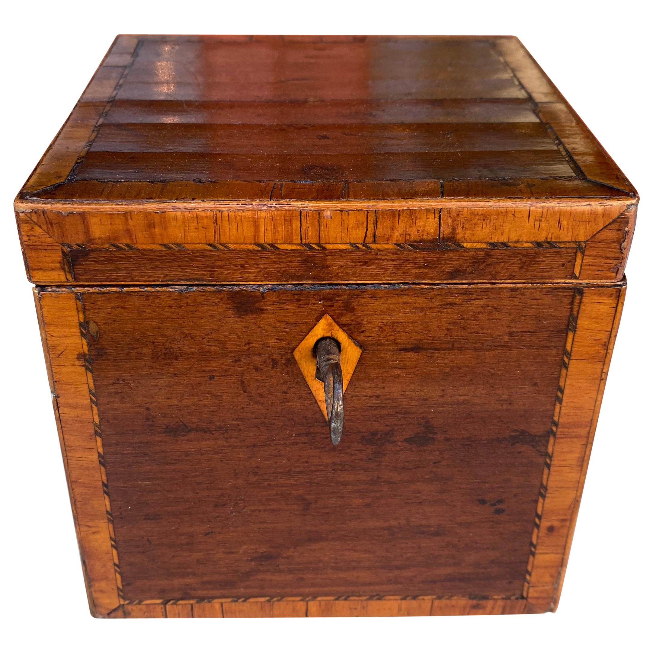Mahogany inlaid cube tea caddy with key early 19th century