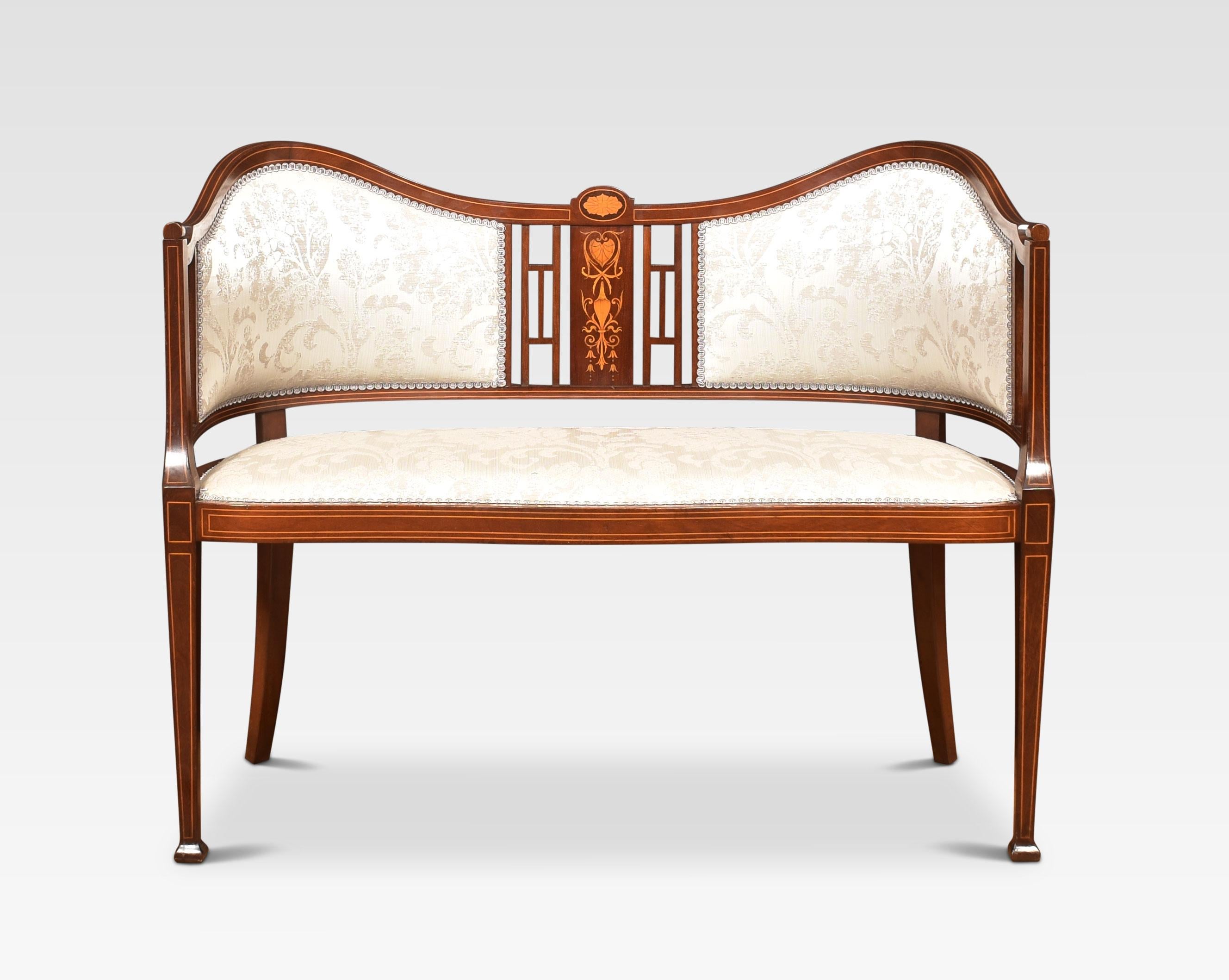 Mahogany inlaid settee, with twin upholstered back panels flanking the inlaid splat. To the upholstered seat flanked by out swept arms. All raised up on square tapering legs.
Dimensions
Height 32 Inches height to seat 18 Inches
Width 39