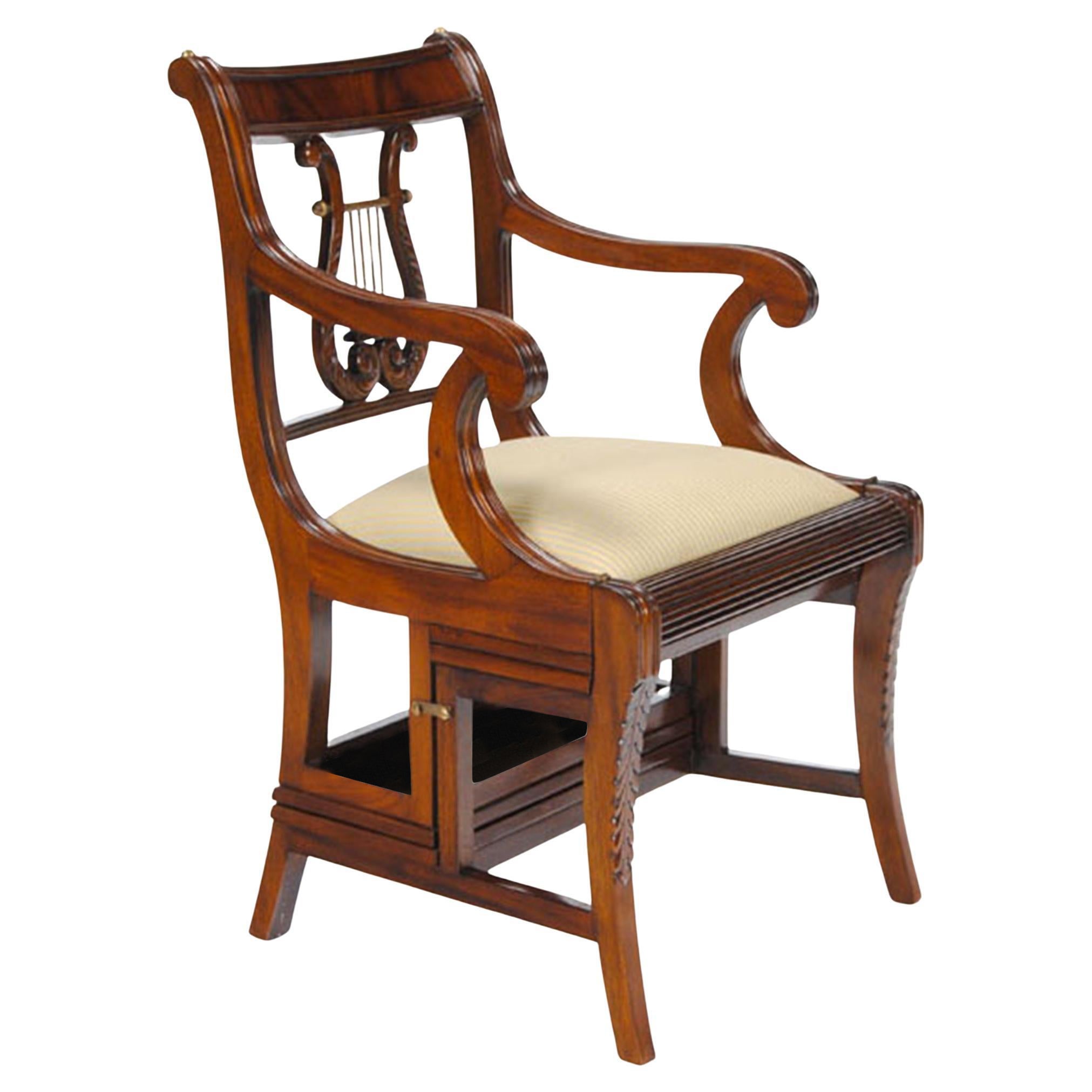 The Mahogany Library Chair, also known as a metamorphic chair as created by Niagara Furniture. This Mahogany Library Chair is produced with a very desirable harp back, also referred to as a lyre back. Originally fashioned for use in the great