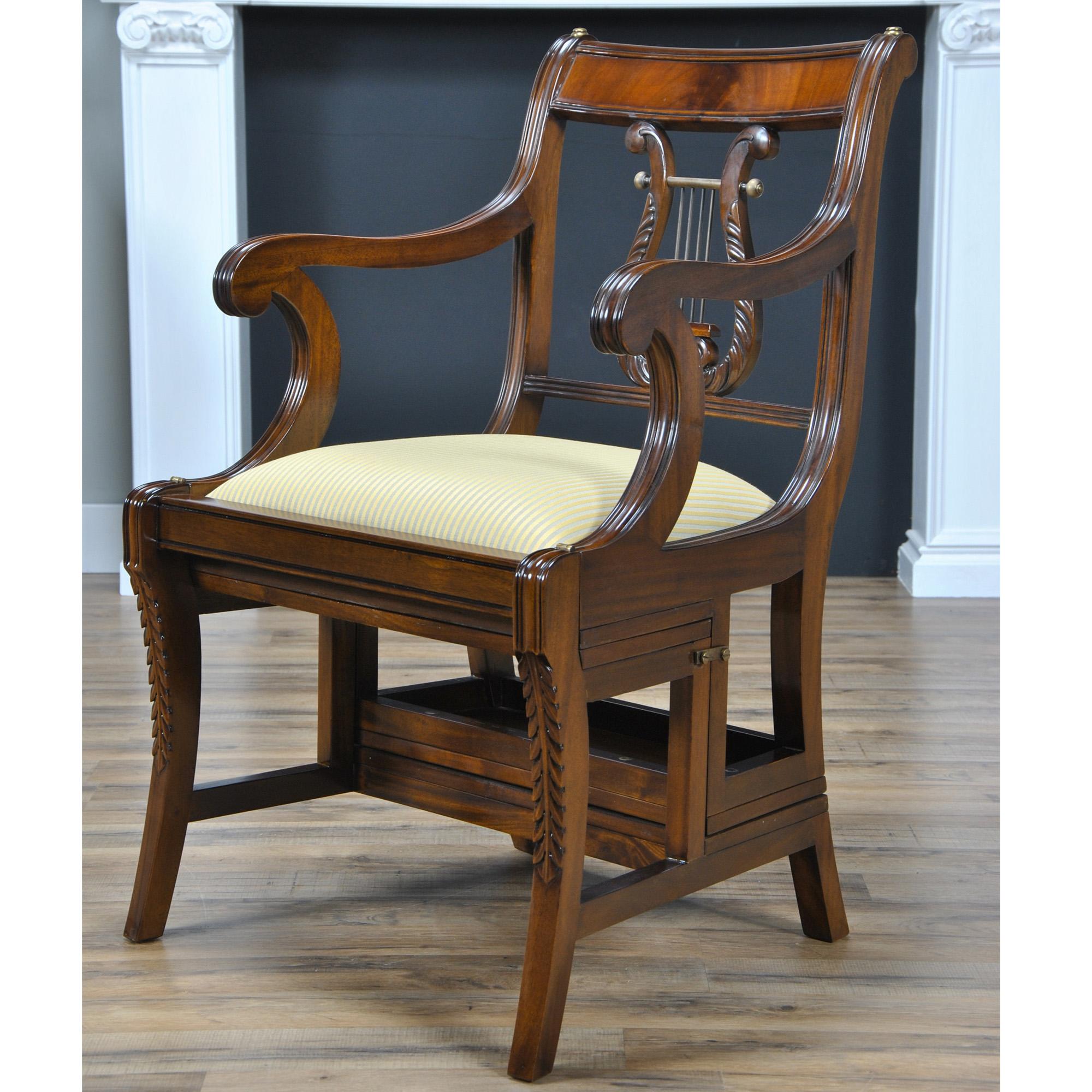 The Mahogany Library Chair, also known as a metamorphic chair as created by Niagara Furniture. This Mahogany Library Chair is produced with a very desirable harp back, also referred to as a lyre back. Originally fashioned for use in the great