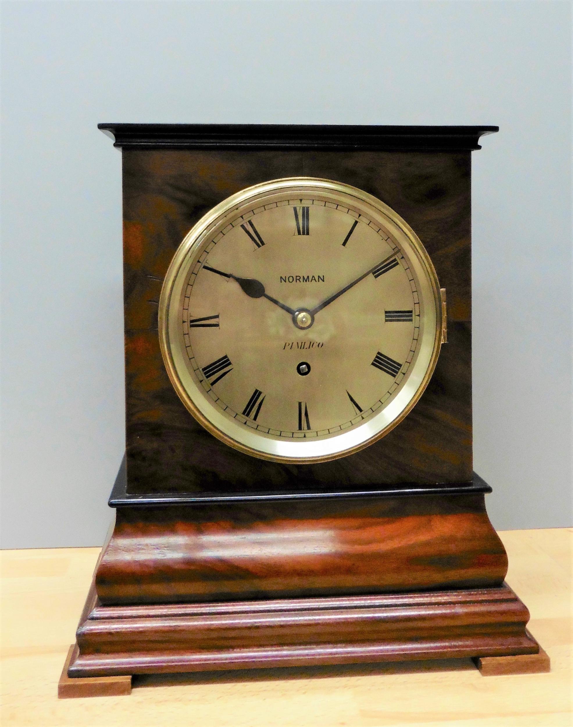 Library bracket clock by Norman, Pimlico


Finely figured mahogany case with ebony mouldings standing on a stepped moulded plinth and resting on pad feet with bevelled glass viewing aperture to the top of the case.

Hinged cast brass bezel