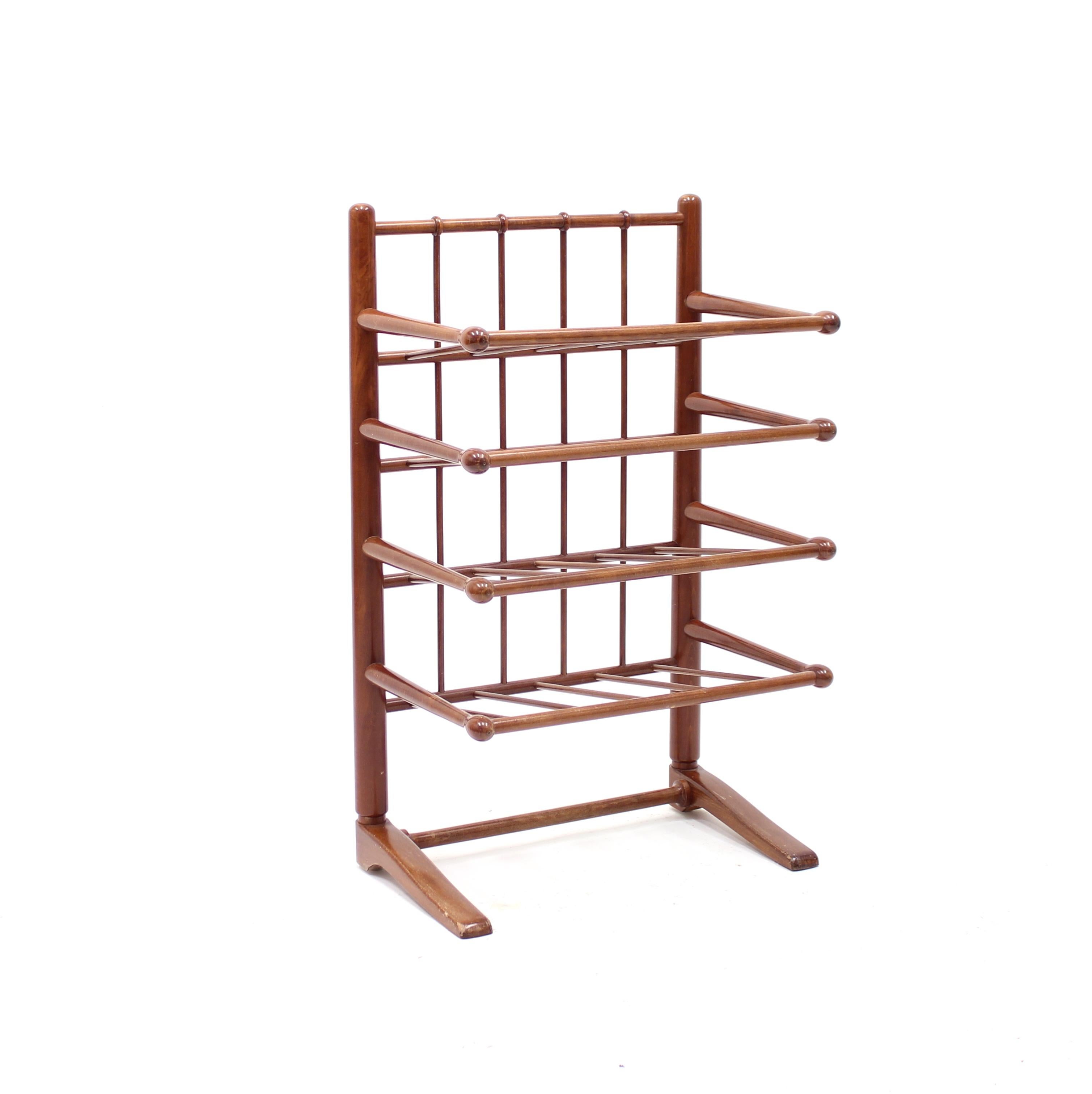 Scandinavian magazine or note rack in mahogany with four shelves, made in the 1950s. This model has for a long time been attributed to Josef Frank and equally often also to Danish designer Frits Henningsen. It may be some of them but proof of this