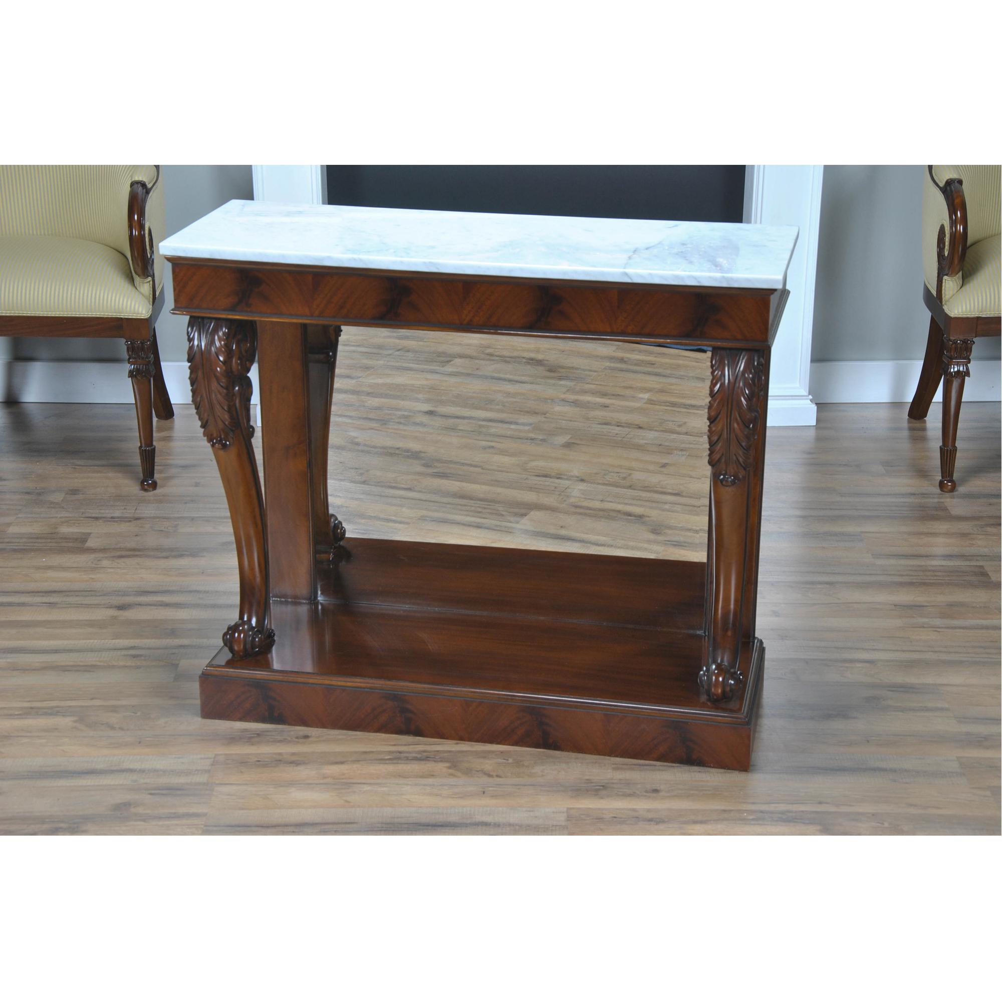 A great accent piece this Mahogany Marble Top Console which was originally designed for use in a front entry way but our clients tell us they find uses for it in almost every room of their homes. The detachable marble top rests on a beautiful frieze