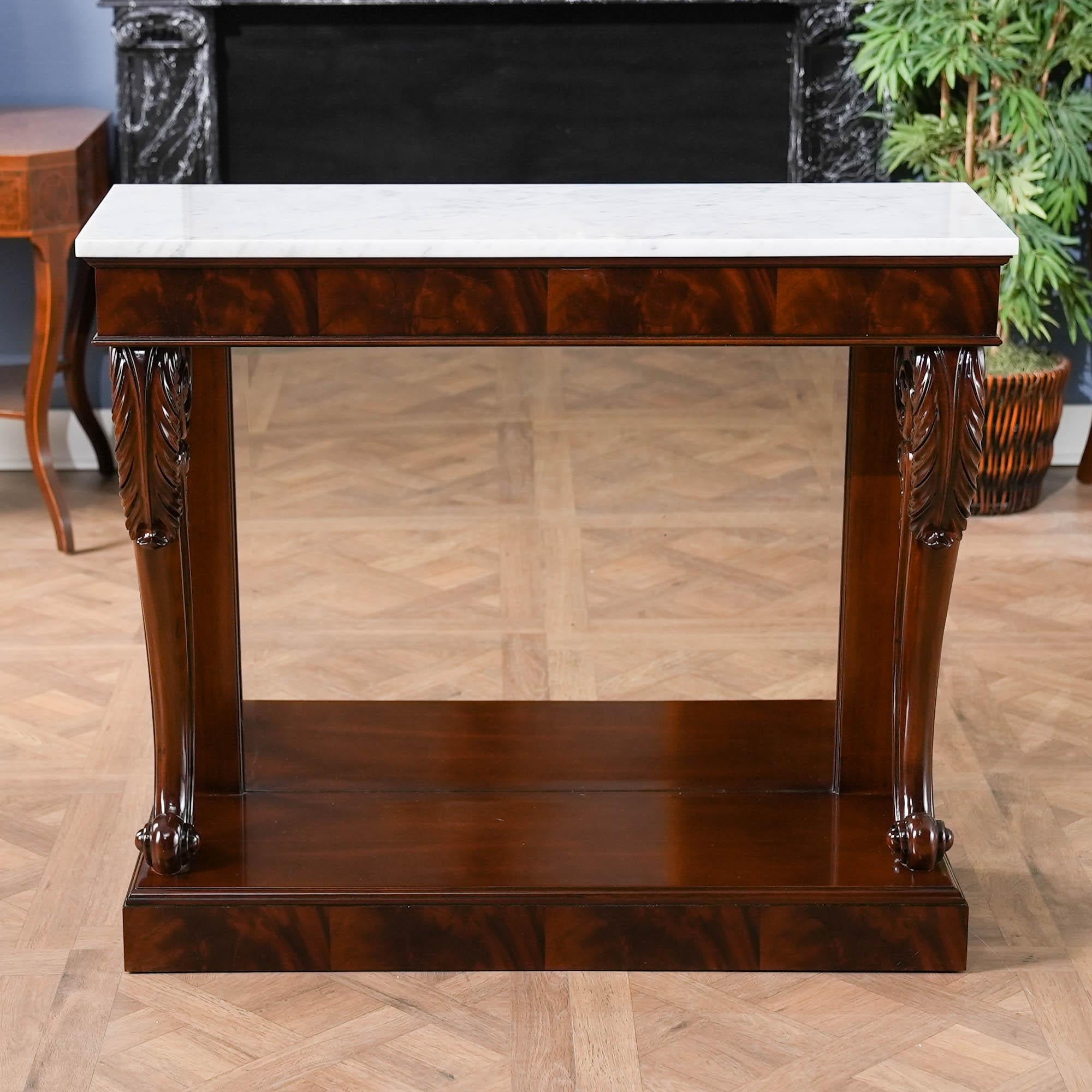 A great accent piece this Mahogany Marble Top Console which was originally designed for use in a front entry way but our clients tell us they find uses for it in almost every room of their homes. The detachable marble top rests on a beautiful frieze
