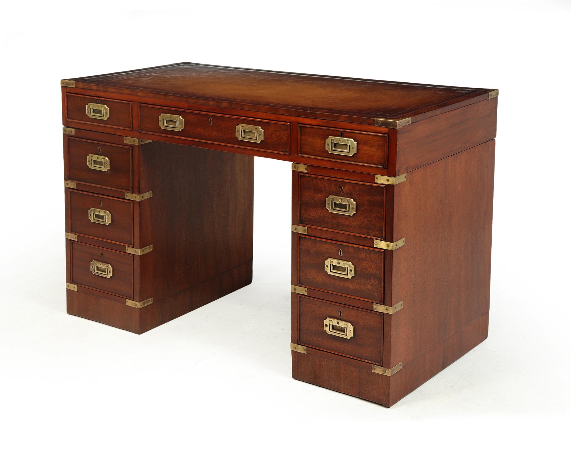 A lovely military style desk from around 1860, Structurally sound, the desk has had repairs in its lifetime, some locks have been changed the desk has great patina and colour variations to the wood.

The desk has been professionally restored and