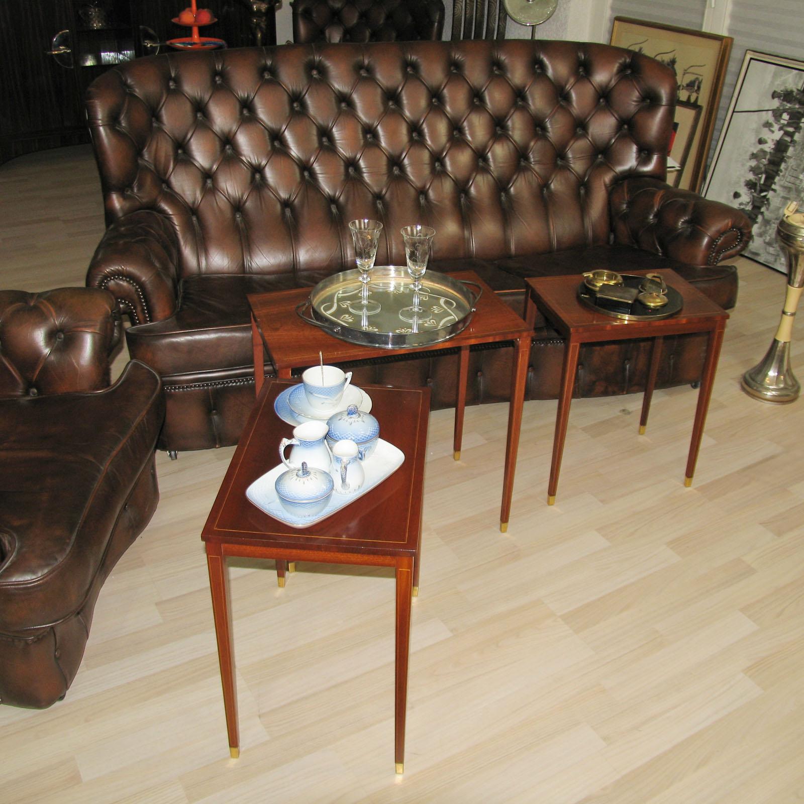 Mahogany nesting tables, Bodafors, Svenska Möbelfabrikerna, Sweden, 1950s
Three nesting tables in Gustavian style, made of mahogany, with inlay and brass sleeves. In original condition, minimal signs of wear. Marked under the top with manufacturer