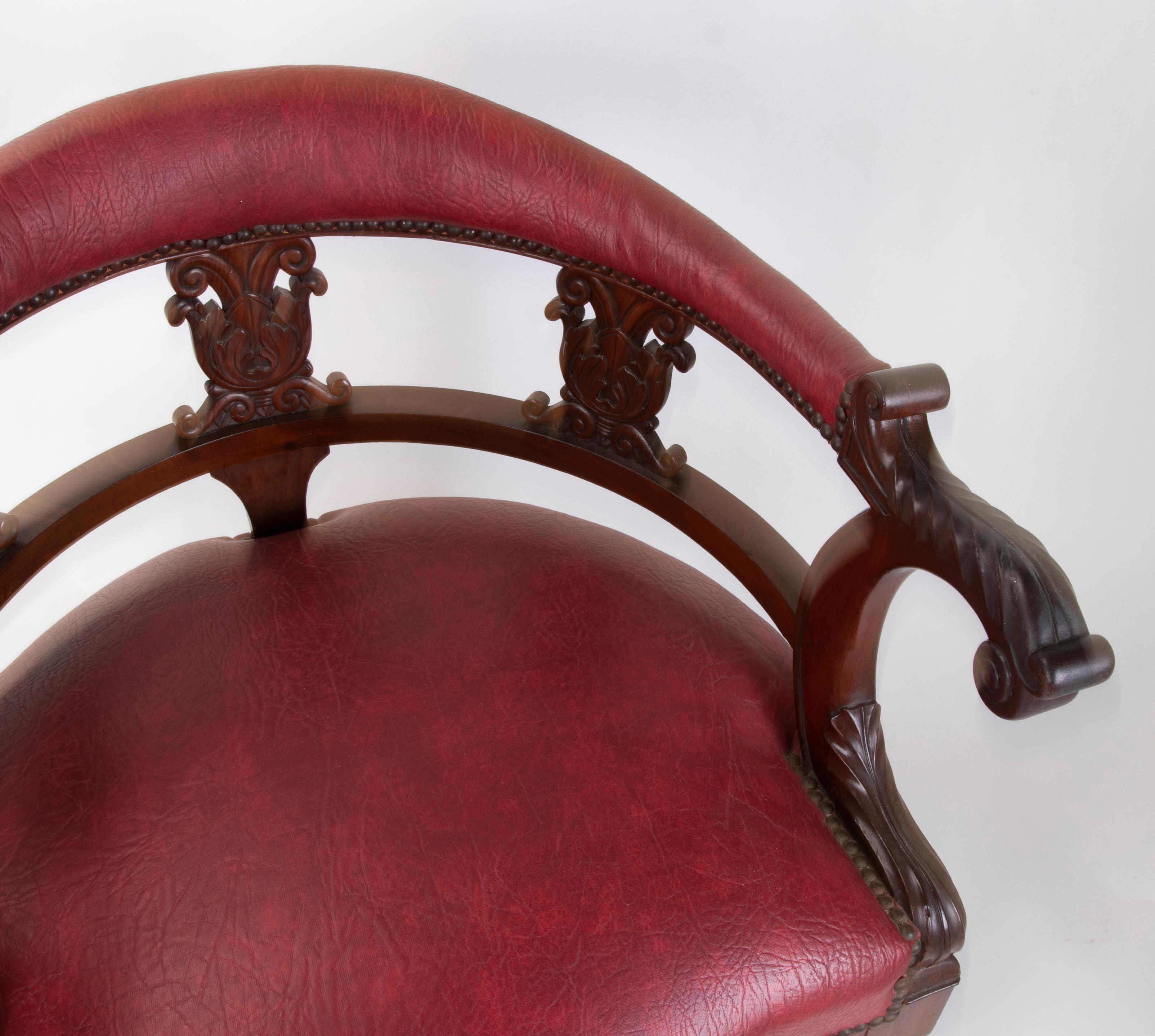 20th Century Mahogany Office Chair with Bronze Wheels and Faux Leather Seating and Backrest For Sale