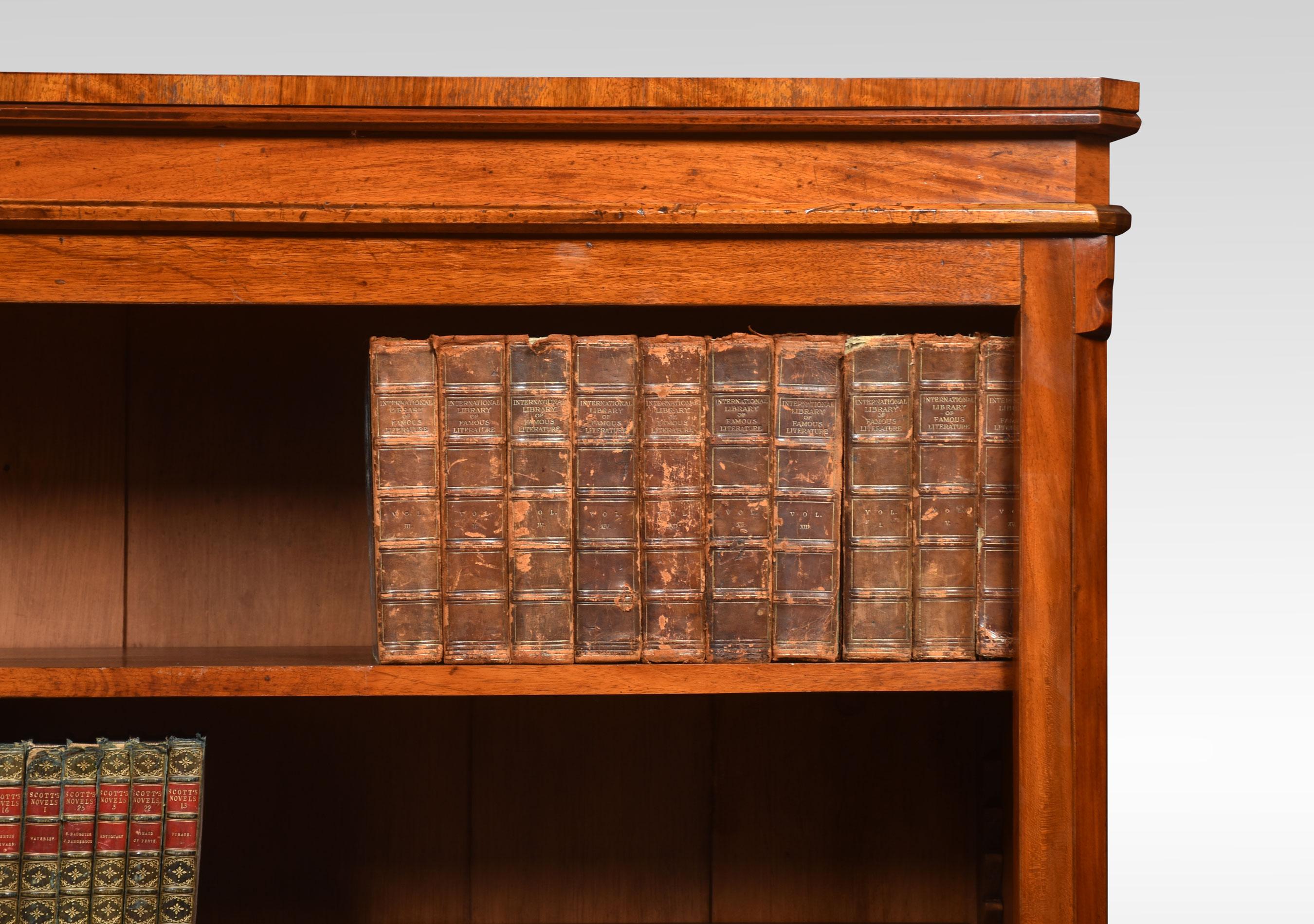 Mahogany open bookcase the rectangular top with molded edge above adjustable shelved interior flanked by canted columns all raised up on plinth base.
Dimensions
Height 62 Inches
Width 47.5 Inches
Depth 14.5 Inches.