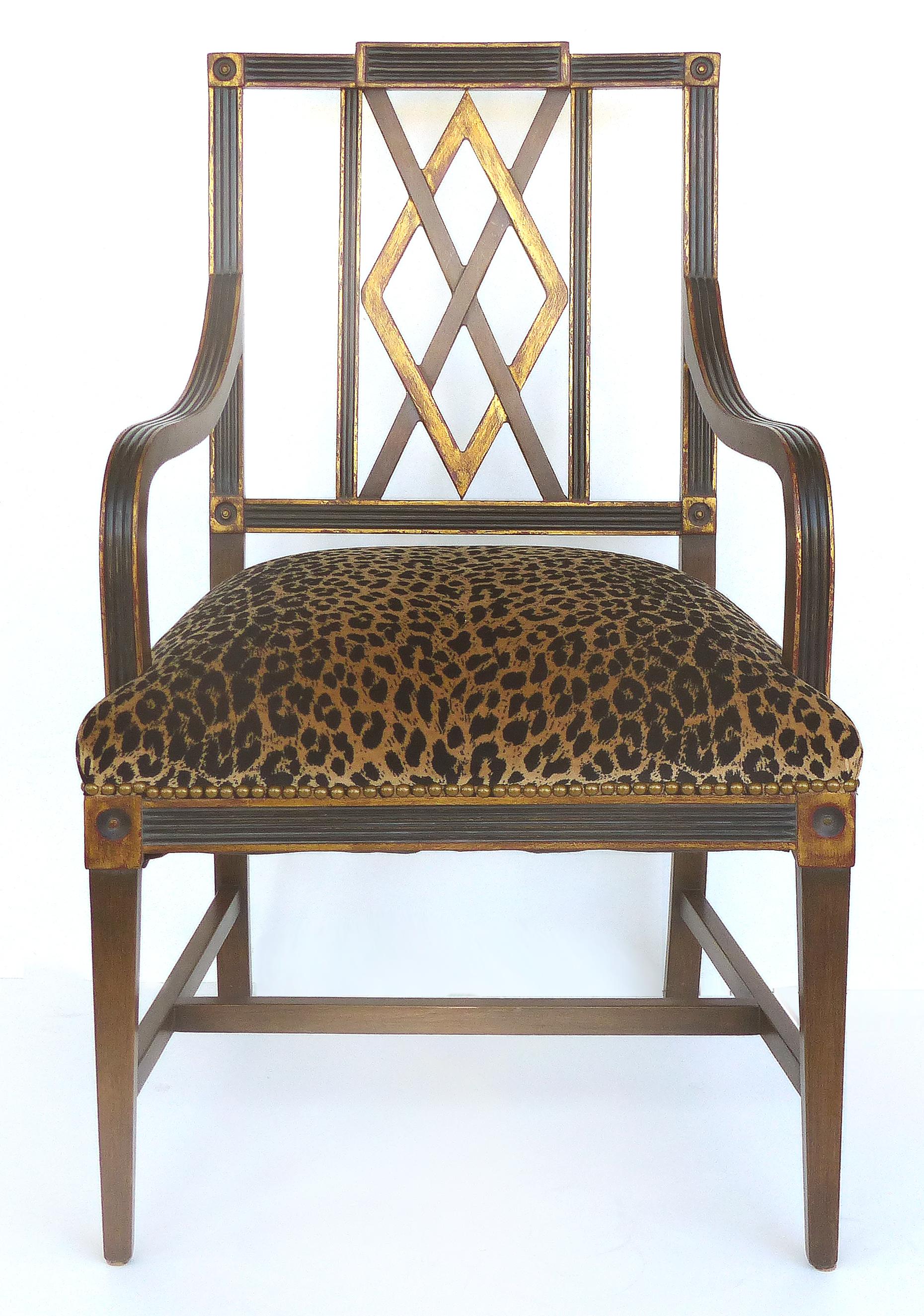 Mahogany Parcel Gilt Set of 6 Dining Chair, Slat Backs and Leopard Print Velvet

Offered for sale is a set of six mahogany armchairs with carved ribbed frames and gilt highlights throughout the slat backs which depict an 