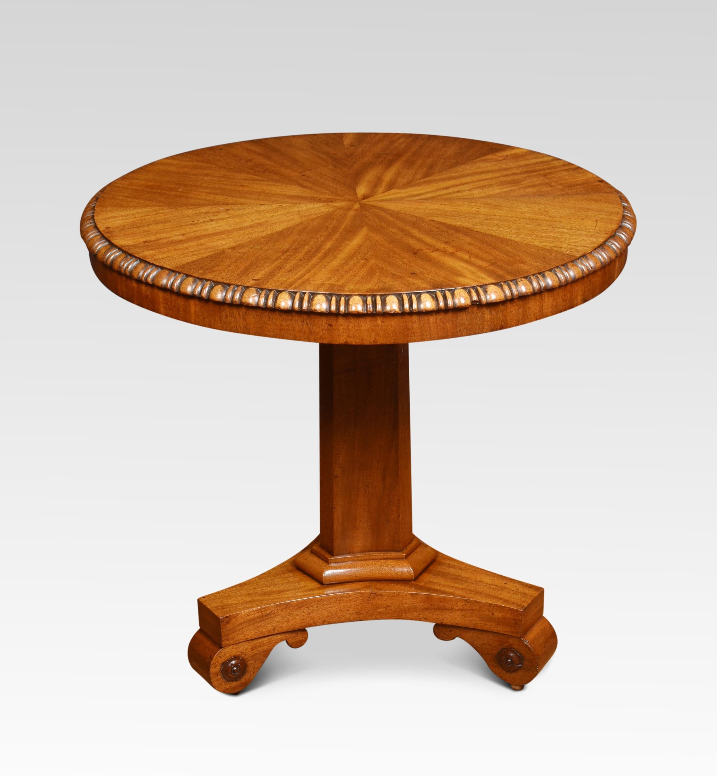 Mahogany pedestal table the well figured circular tilting top enclosed by the gadrooned border. Raised up on a concave hexagonal column. To the triangular base terminating in scroll feet and recessed castors
Dimensions
Height 29 Inches
Width 30.5