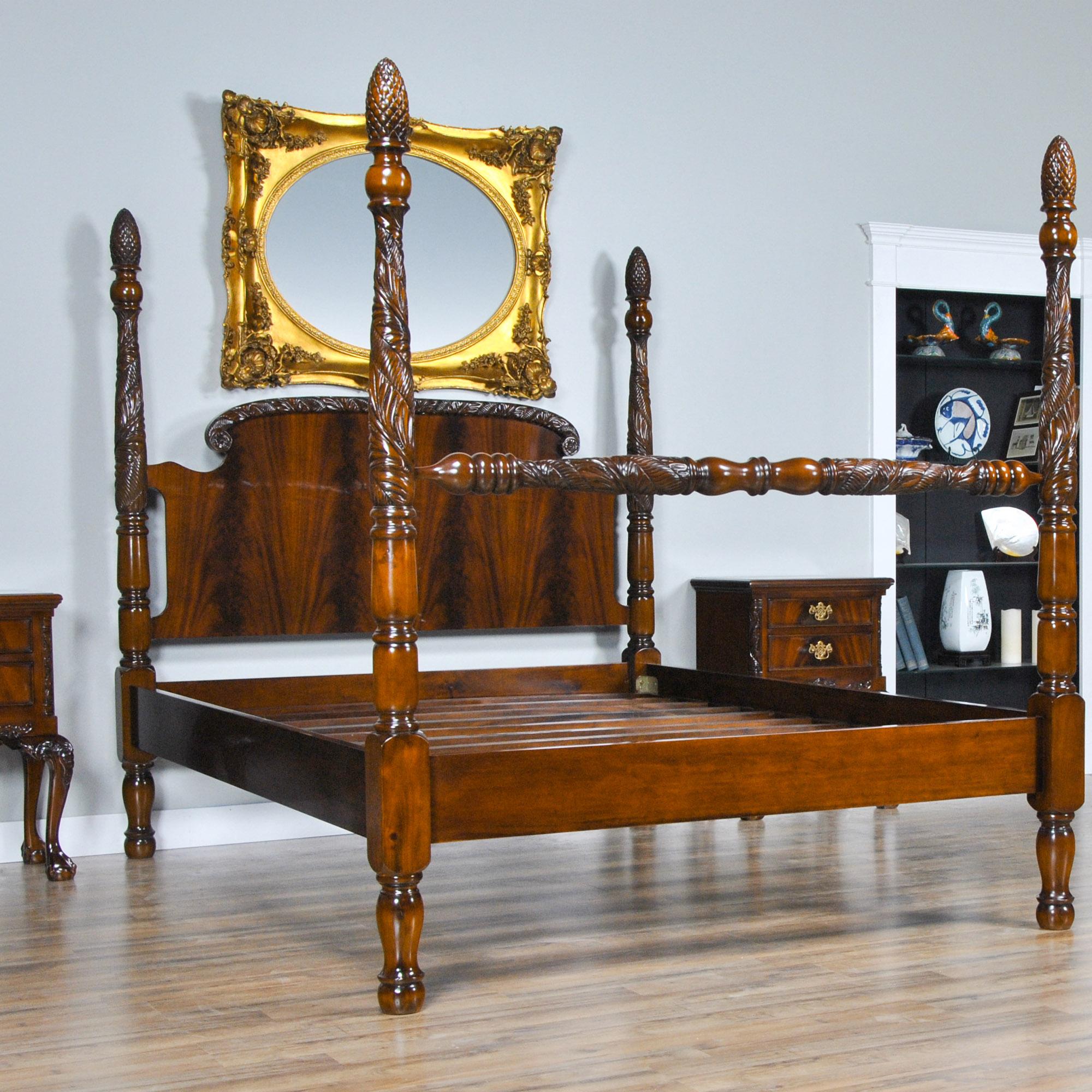 A Mahogany Queen Size Poster Bed with Hand Carved Pineapple Topped Posts. A Solid Mahogany Frame and the finest mahogany veneered headboard panel combine together to create a high quality, beautiful and elegant bed. This piece compliments many of