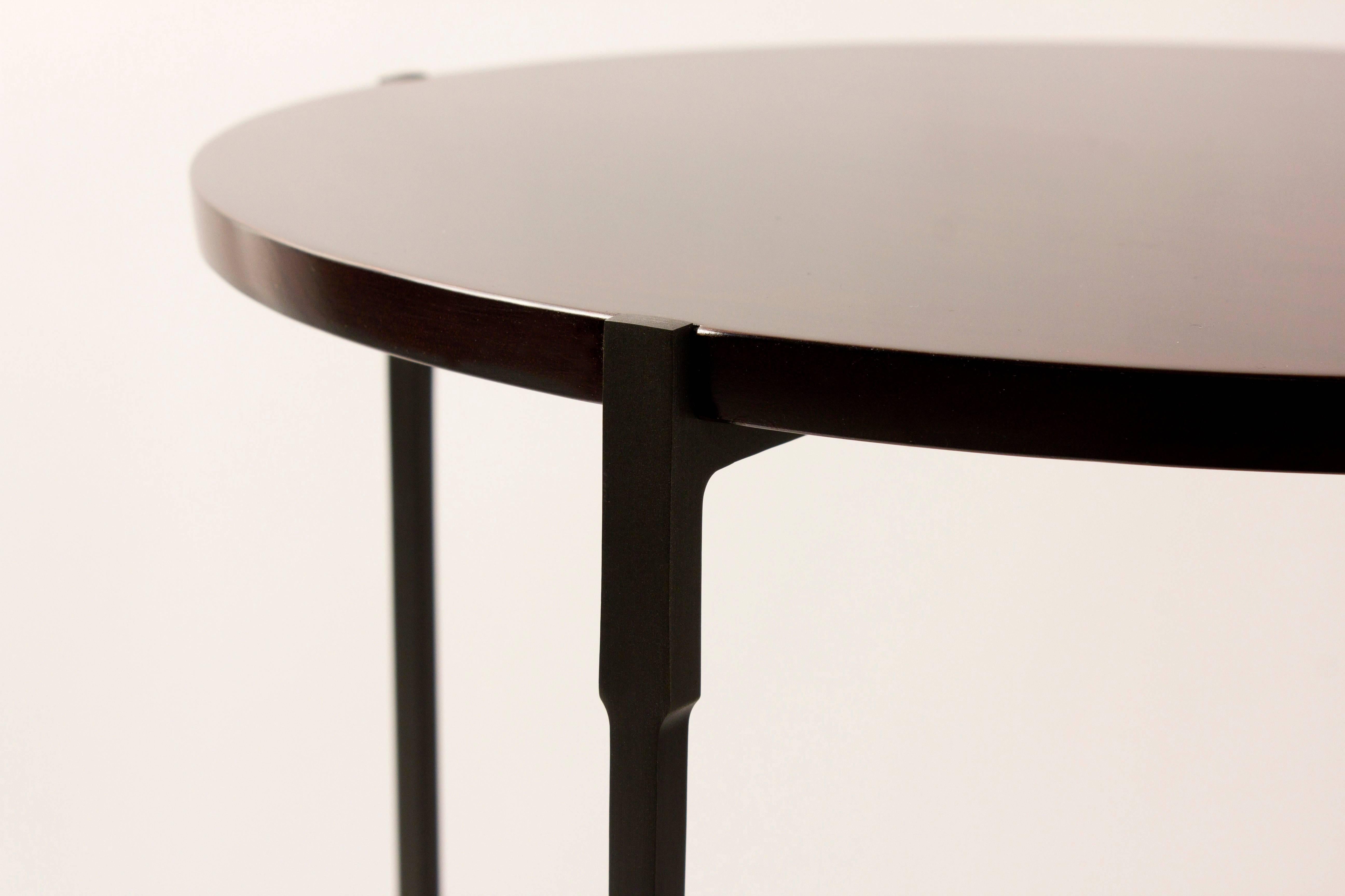 Bronze sculptured foot structure and glossy mahogany top round side table.
Dimensions: H 64 cm x D 46 cm.

 