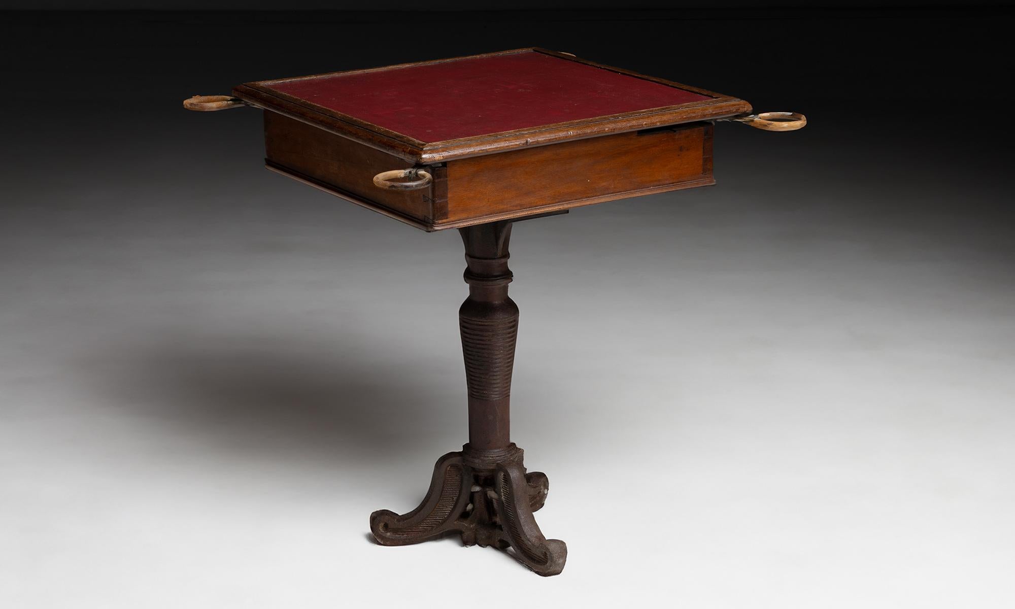 Mahogany Ships Table

England circa 1900

Square mahogany table with fold out holders for drinks or gaming chips. The table top is inset with faux leather on a cast iron base.

29”w x 28.5”d x 30”h