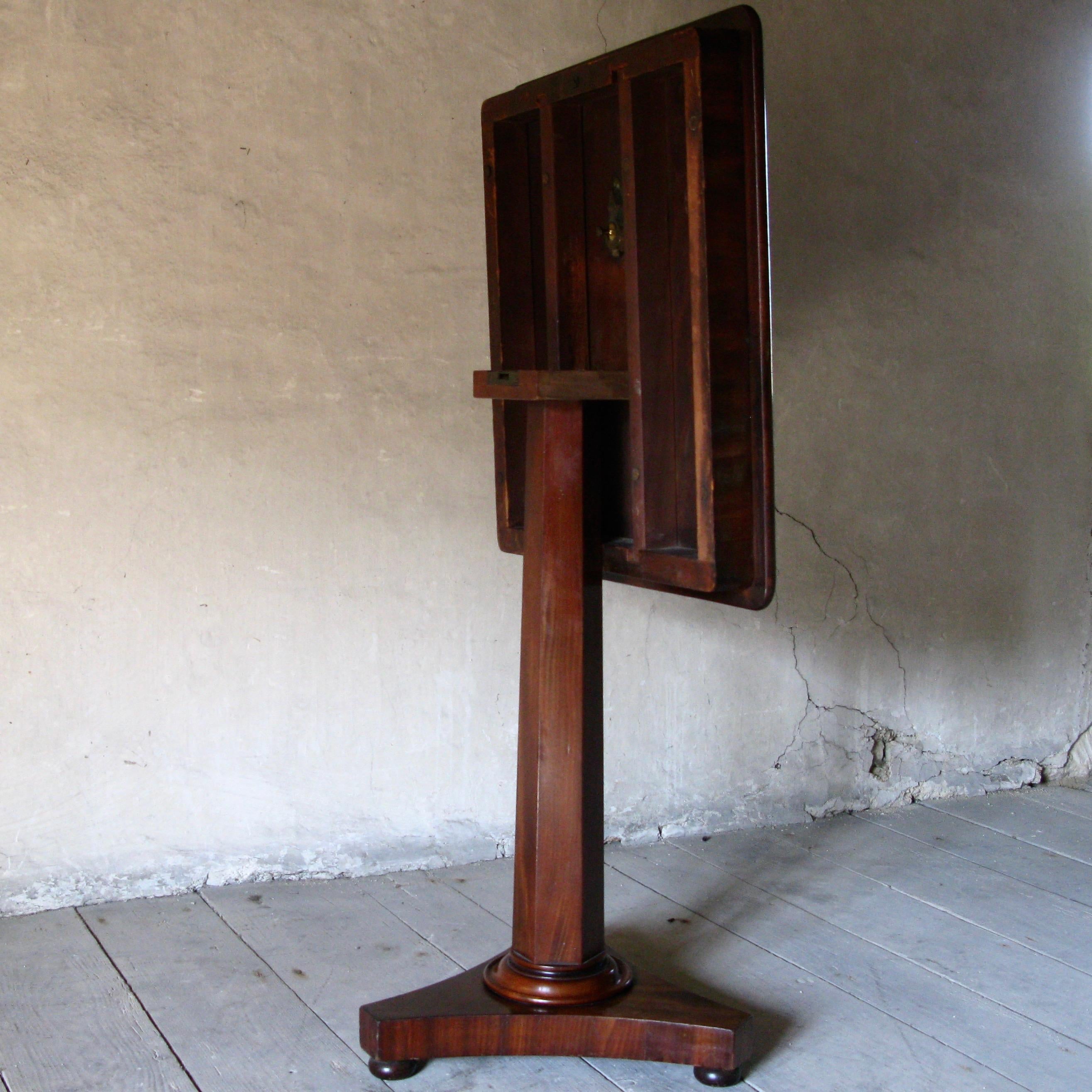 Very elegant table made in England, mid-19th century. 

The square top is quiet unusual for these small tripod tables, you mostly find them round.

On the top there are small spots of age, the cubism leg is standing on 3 balls which make the piece a